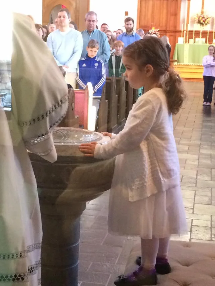 Julianna Grace Johnston receives the Sacrament of Baptism on February 26, 2017