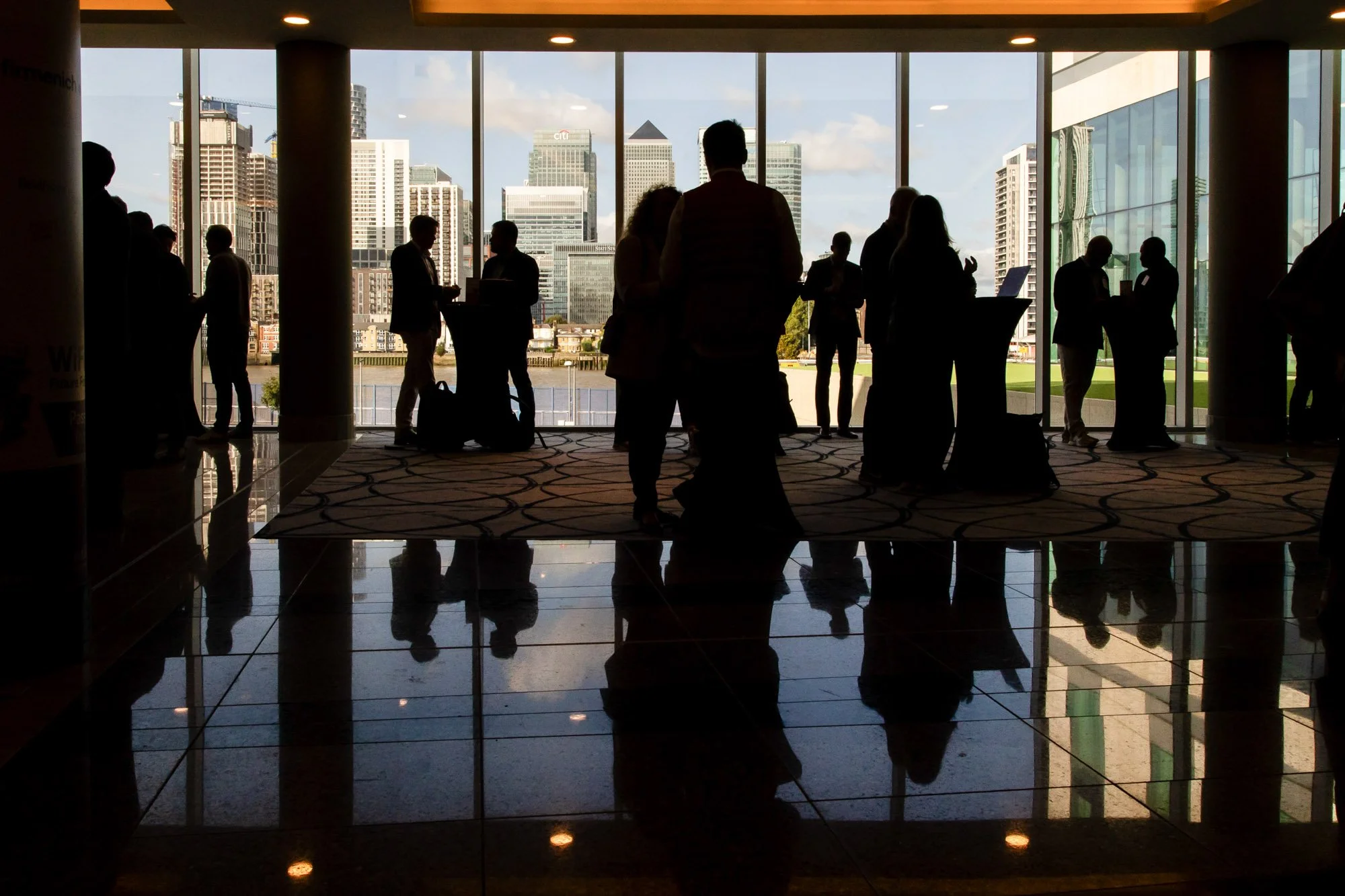kevin-lines-photography-delegates-look-out-over-canary-wharf.jpg