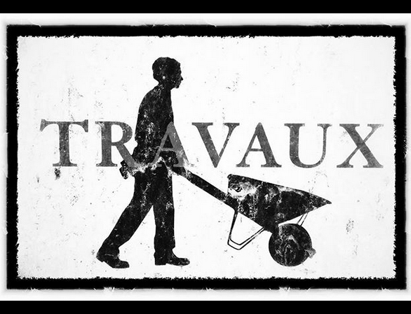 A black graphic silhouette of a man pushing a wheelbarrow on a white background. With the word “travaux” across the image..