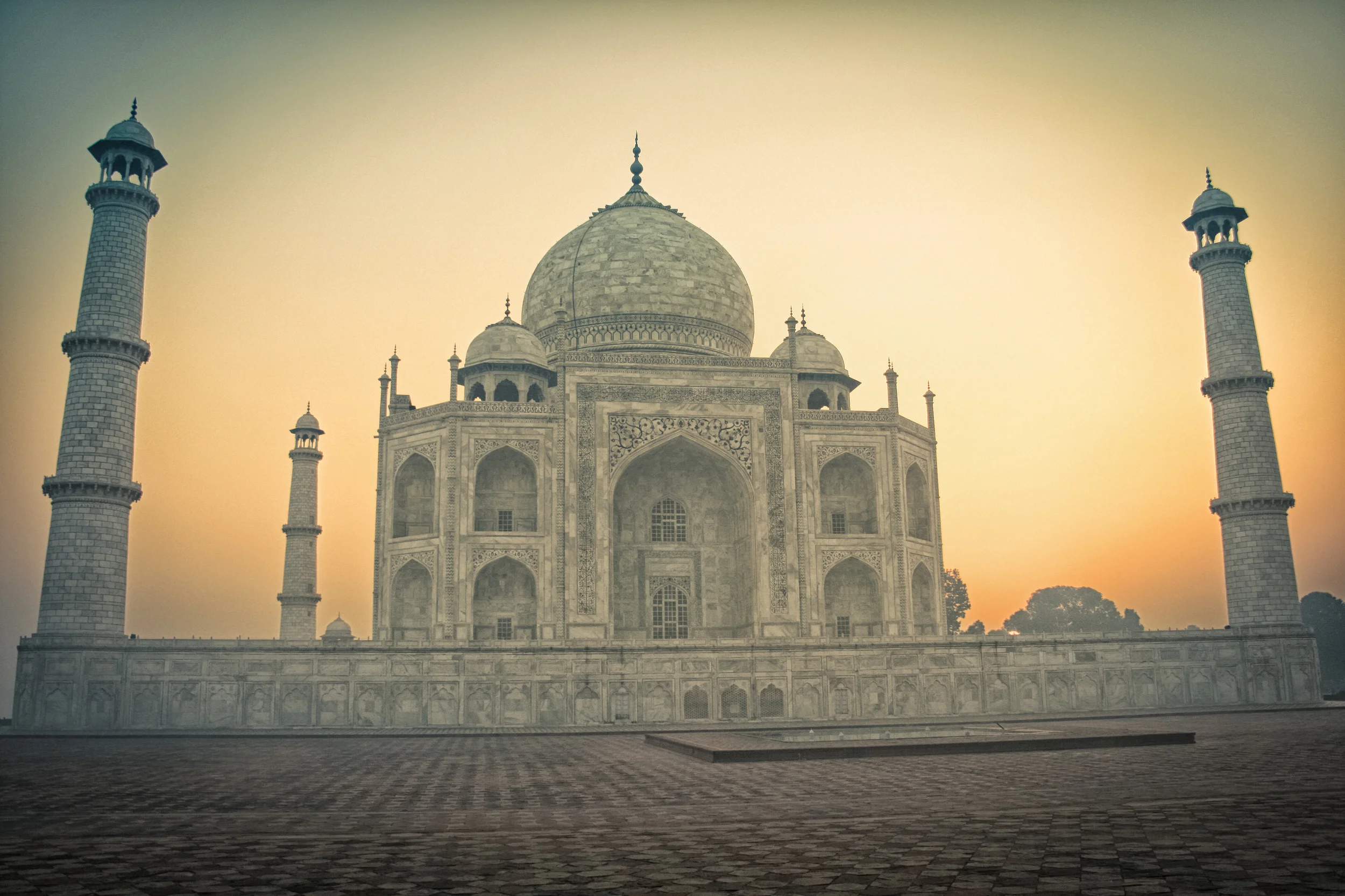 The Sun Rises Behind the Taj Mahal