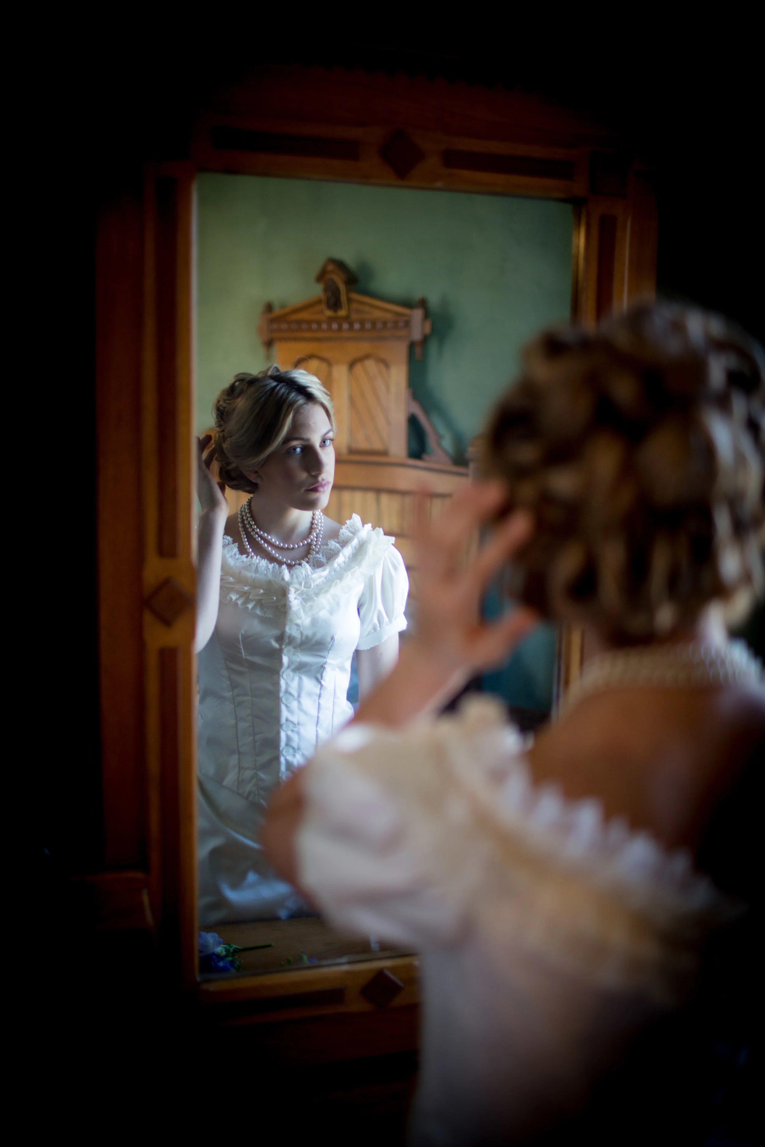 Victorian Woman at Mirror