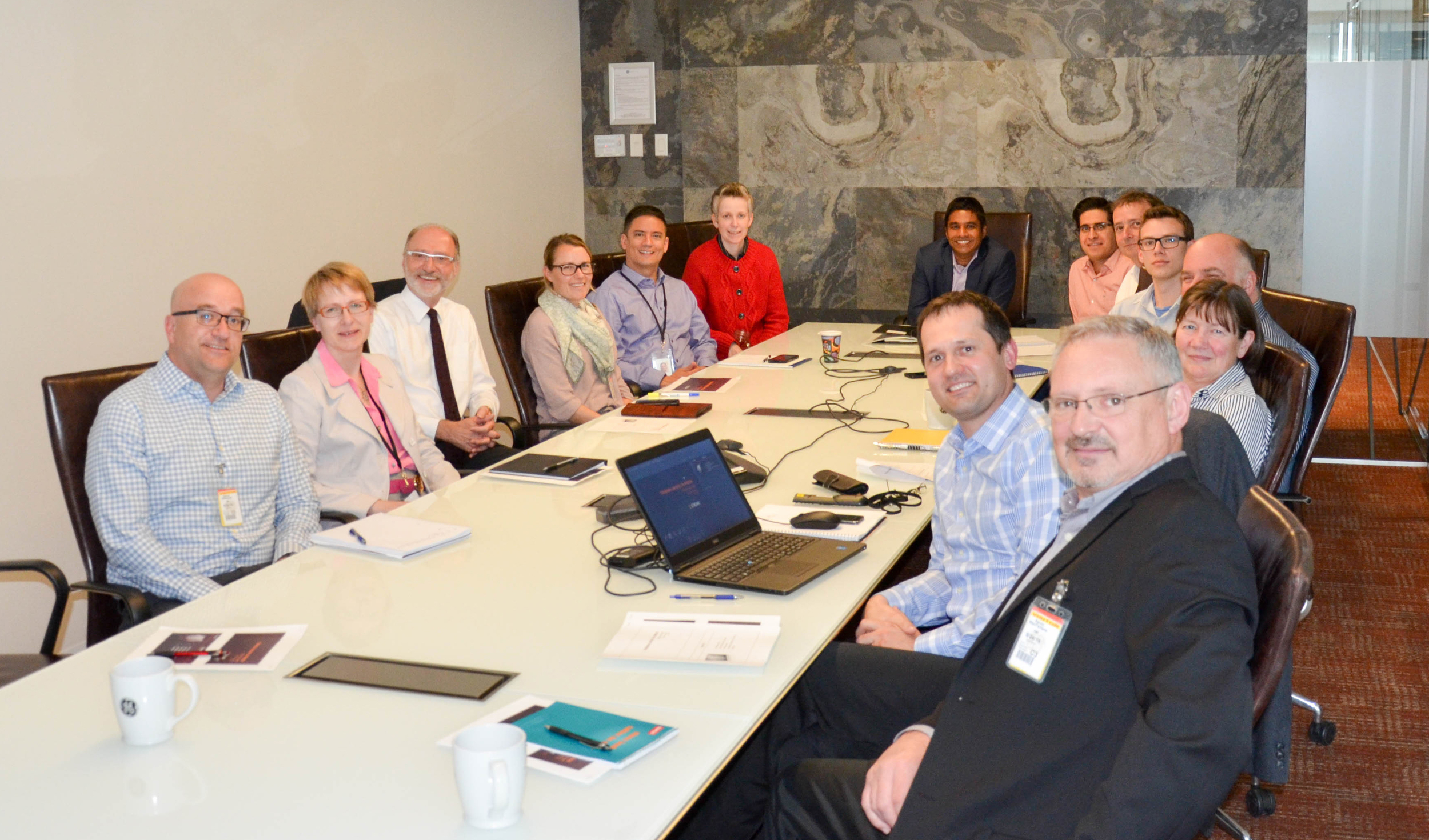 The Stream Team with Kinder Morgan's Kevin MacFarlane (bottom right), and Darren Dillabaugh (bottom left), with GE's Gandeephan Ganeshalingam (back centre).