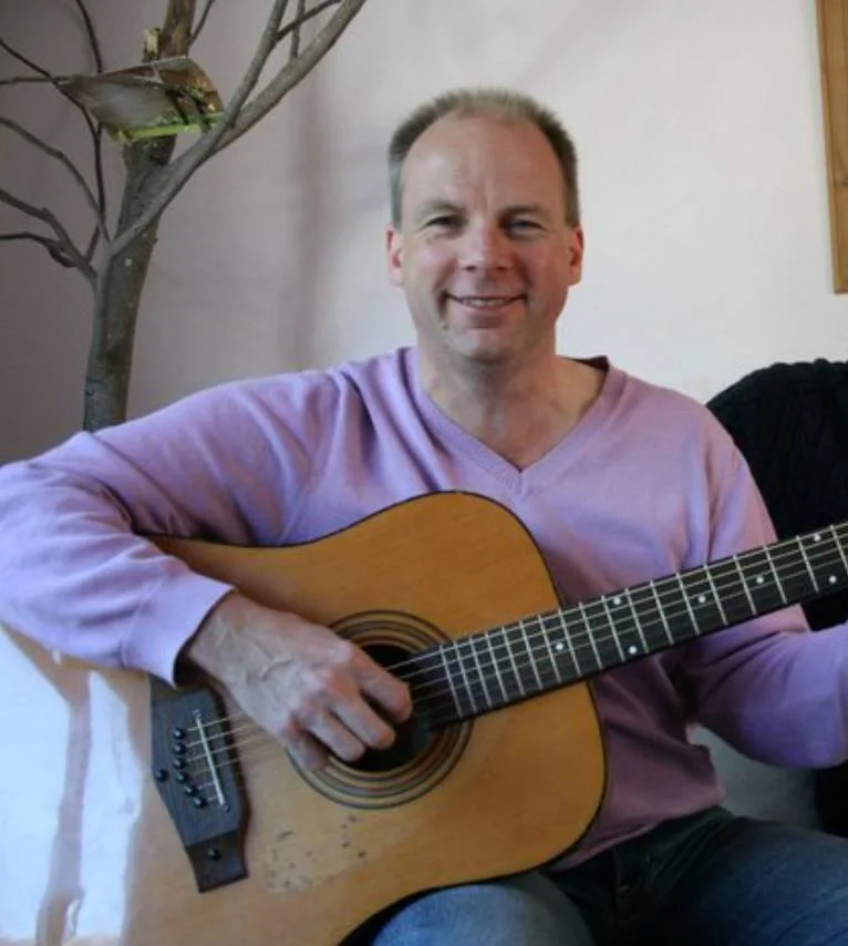 Andy Shipley A bit higher than a Bass Home town: Princes Risborough Dream job: Steward on an airship Real job: Policy and Campaigns Manager When not singing, most likely to be found: Sitting on a mushroom strumming an unfeasibly small guitar. What I love about this group: That no one takes themselves too seriously. Well, apart from...