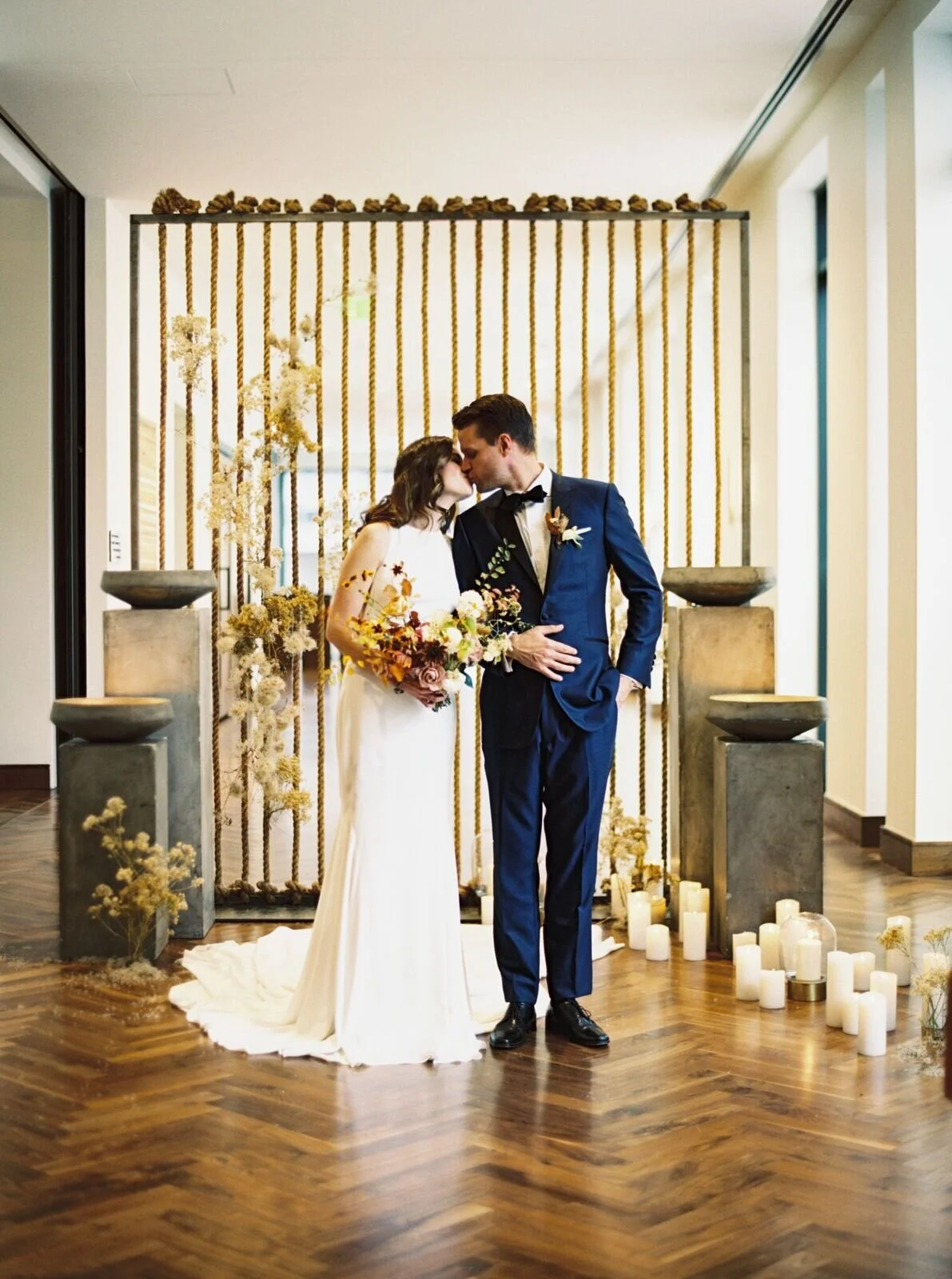 Bride Groom Kissing at Altar.jpeg