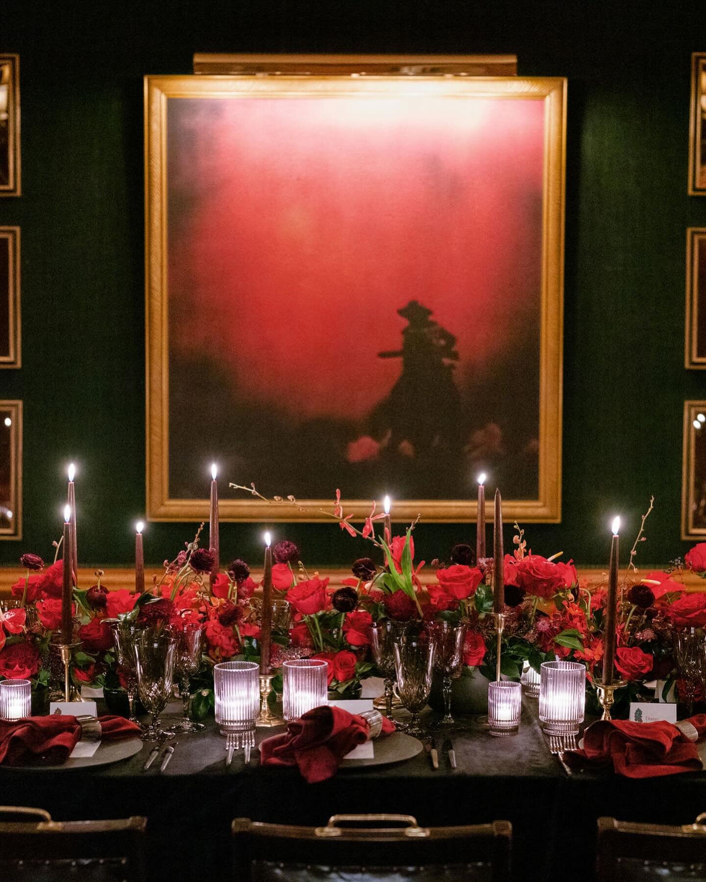 SEEING RED.

Embrace red like never before&mdash;a tablescape saturated in crimson hues, from the petals to the glassware, linens, and beyond. Candlelight sets the scene, inviting guests to gather around the lounge and experience the richness of a mo