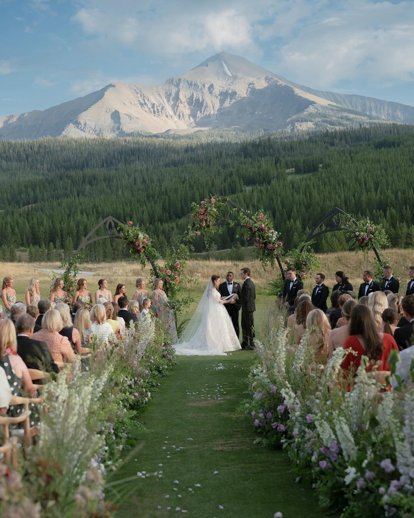 THE VIEW IS GREAT.

Life&rsquo;s a climb, but the views are great&mdash;and this wedding was the epitome of proof. Hues of rosy and lavender blooms traced their way around this celebration, from the altar to the reception. Each detail was steeped in 