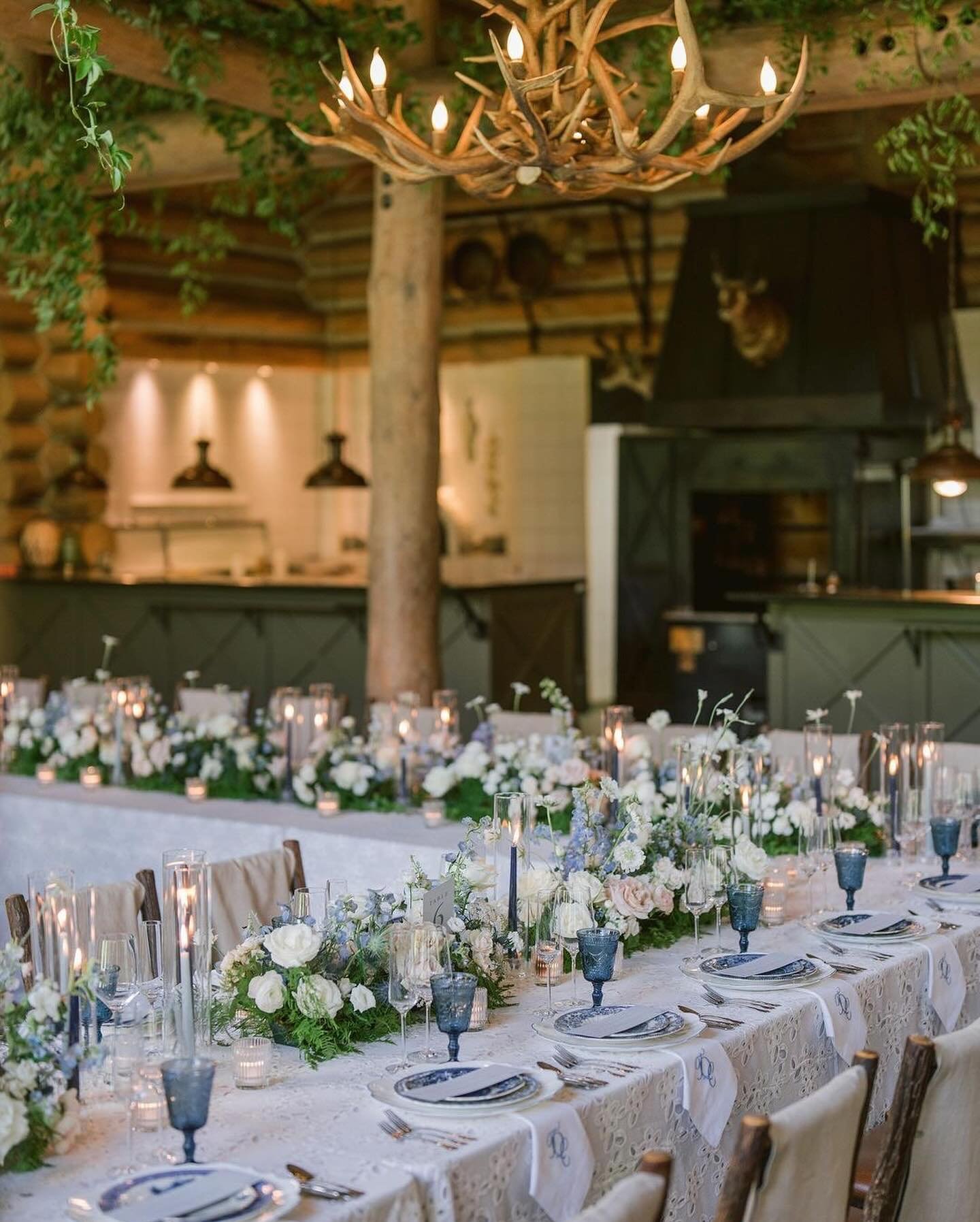 INTO THE BLUE.

This &ldquo;something blue&rdquo; journeyed with the newlyweds and guests alike, manifesting in blooming florals, captivating tablescape decor, and an escort display coveted by all. Far from melancholy, blue infused the celebration wi