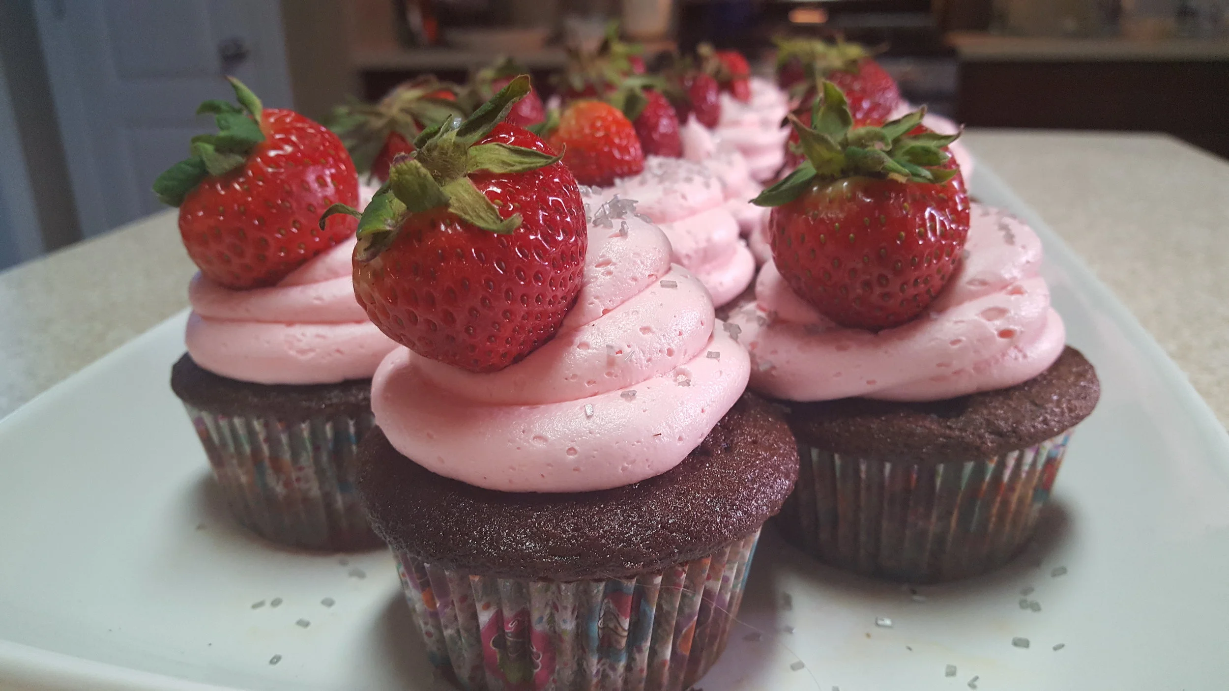 Chocolate Chunk Cupcakes with Strawberry Buttercream Frosting