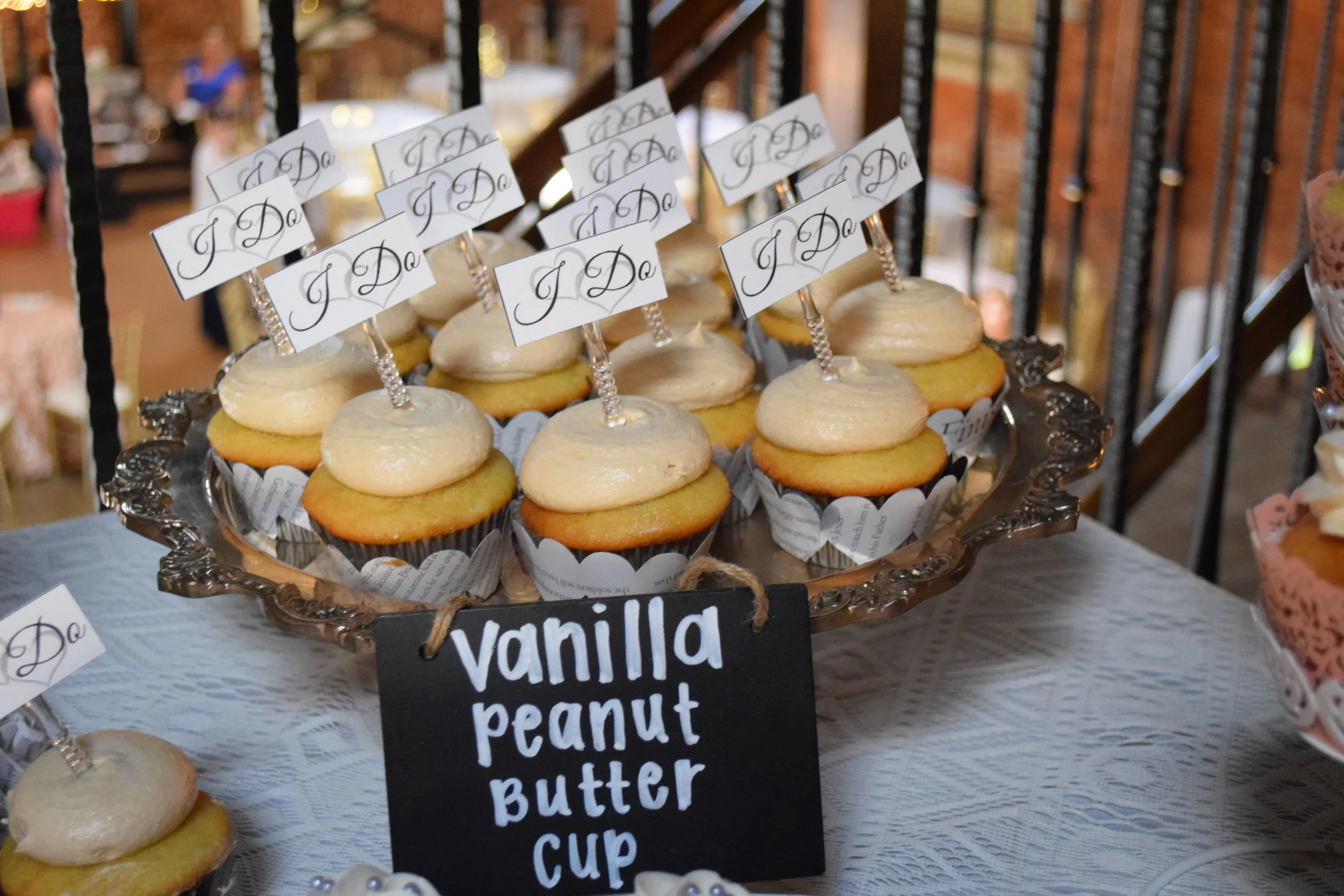 Vanilla Peanut Butter Cup Cupcake with Heart Cut Book Wrap and "I Do" Picks