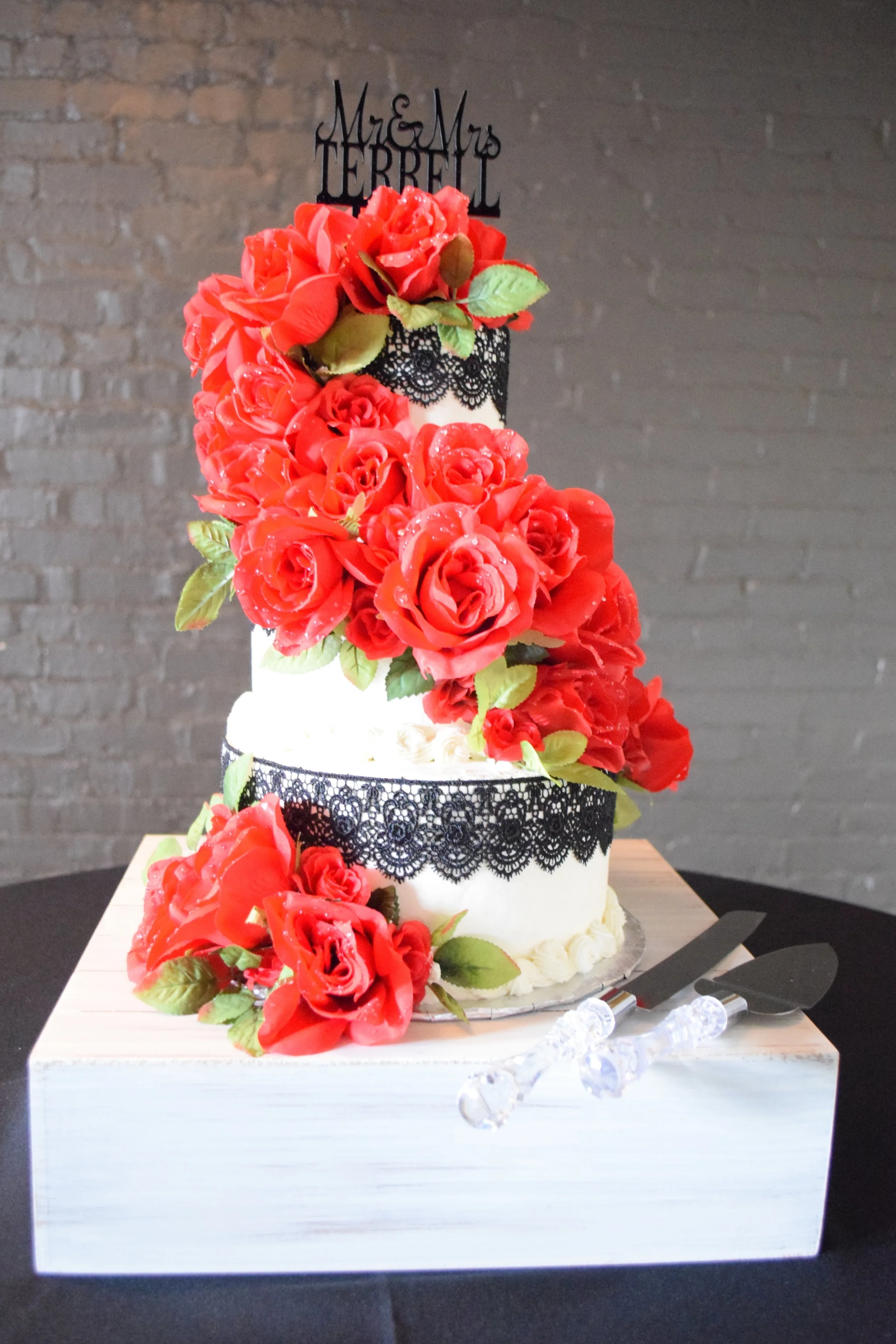 Silk Roses and Black Lace on Buttercream Off-Set Wedding Cake