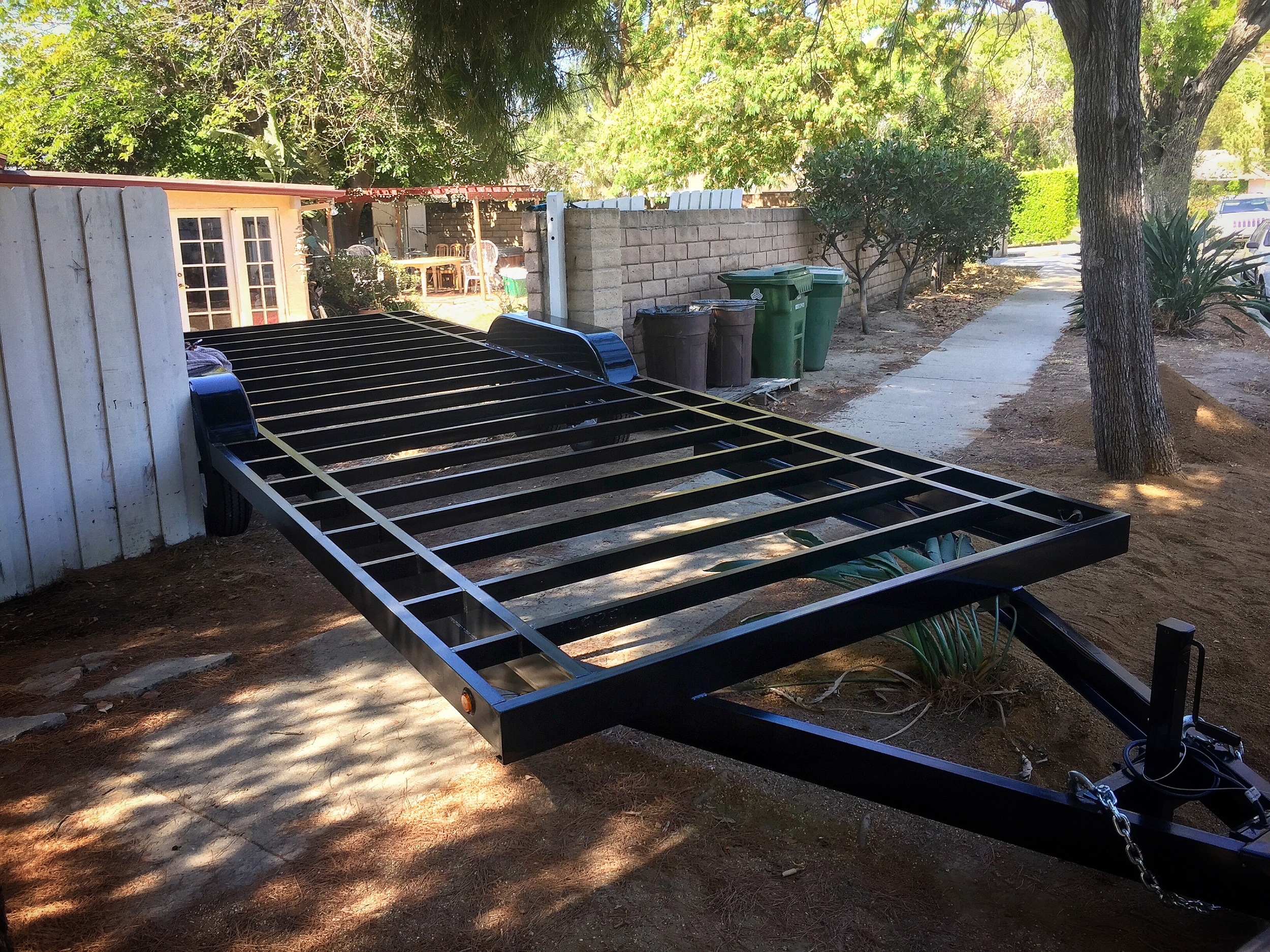 It was a tight fit, but the trailer made it into the backyard with about one inch of clearance on each side.