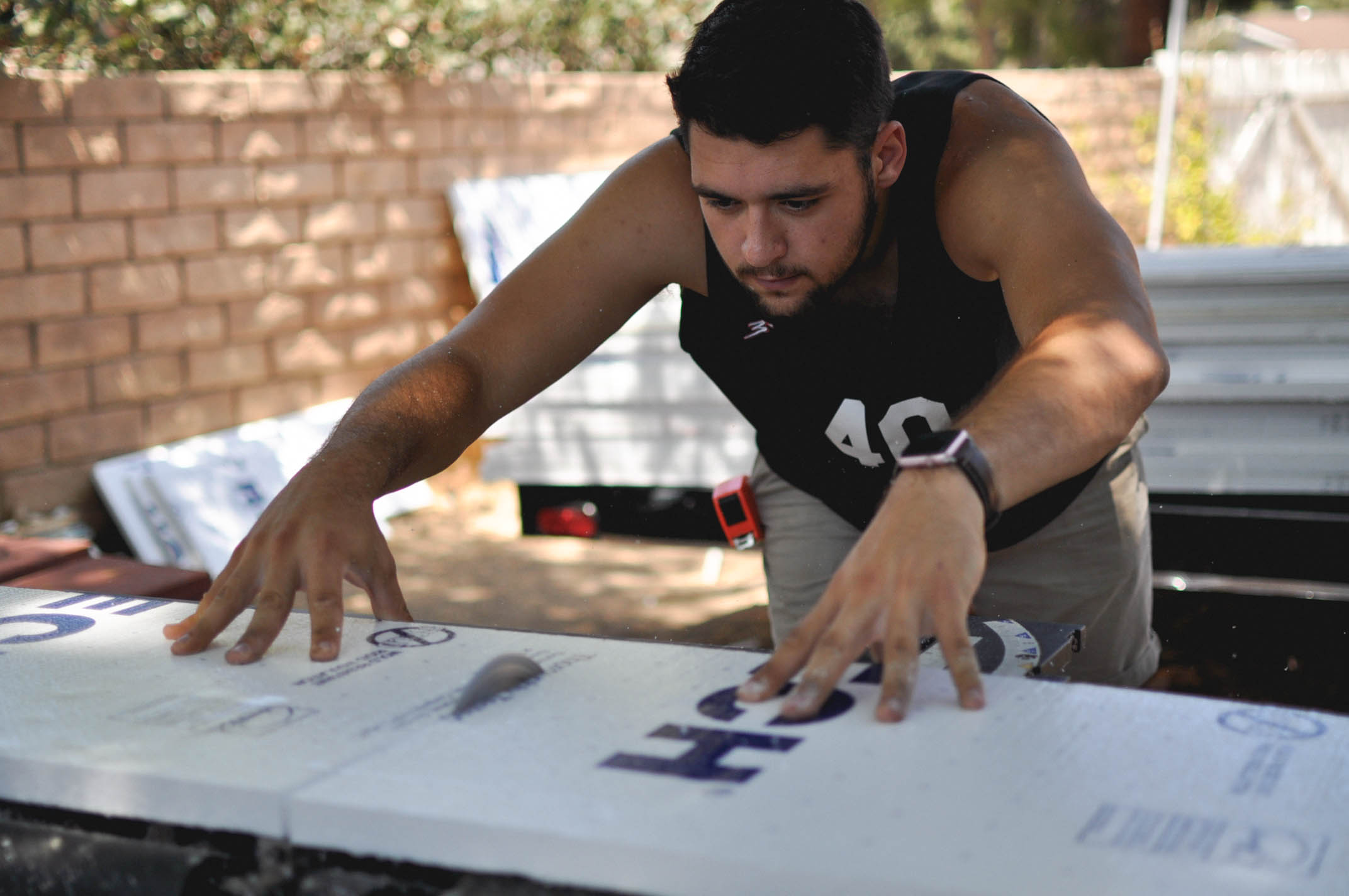 Mike getting it done on the table saw that we bought very cheap at a garage sale.