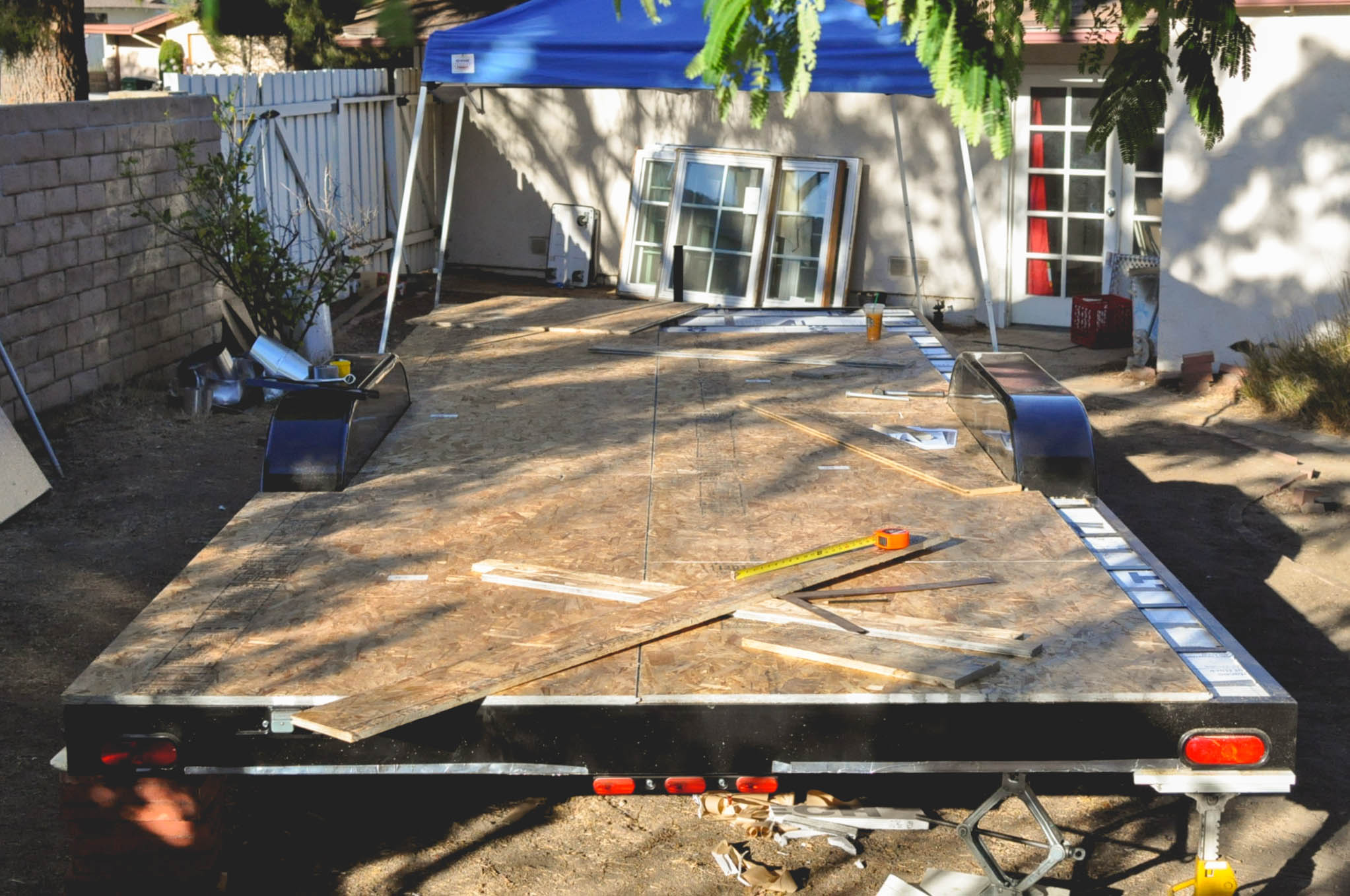 Here's the trailer as it looked while we were placing the subfloor. This was before we changed the plan to account for the sills around the edges of the subfloor, not above the subfloor.