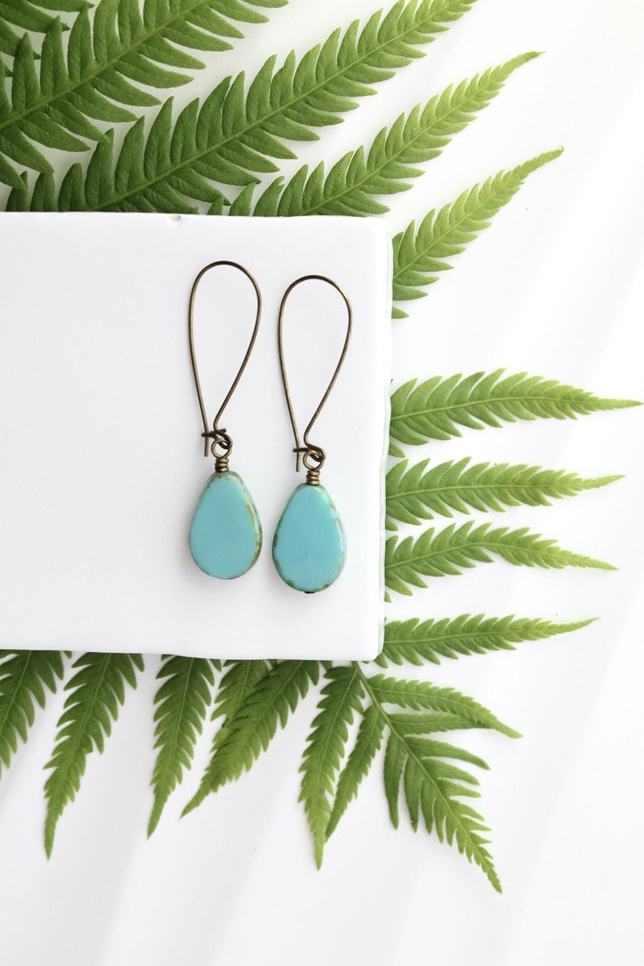 blue glass teardrop earrings .jpeg