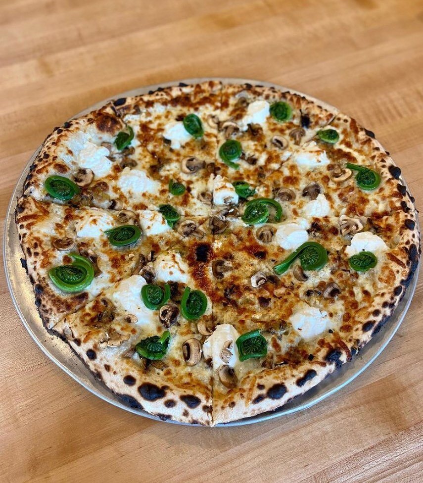 Whim of the week-end! Fresh local Fiddleheads with mushrooms, ricotta, fontina blend &amp; white sauce! This might last as long as fiddlehead season, here &amp; gone, get yours now!