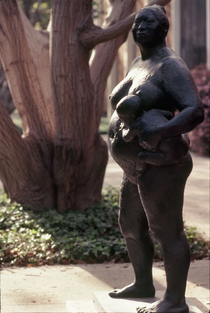 Woman With Child At Her Hip