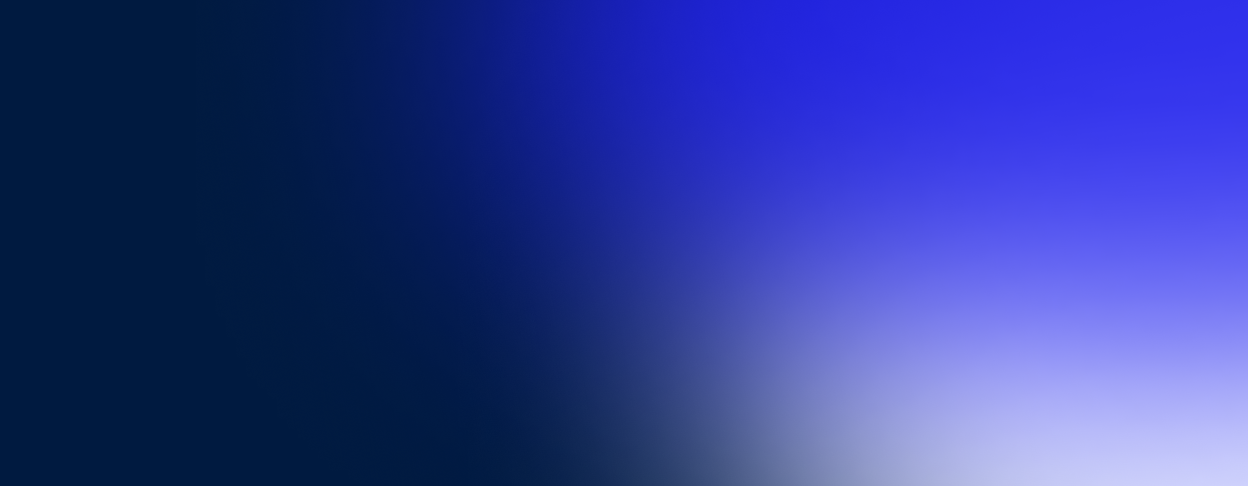 Abstract gradient background blending dark blue to purple.