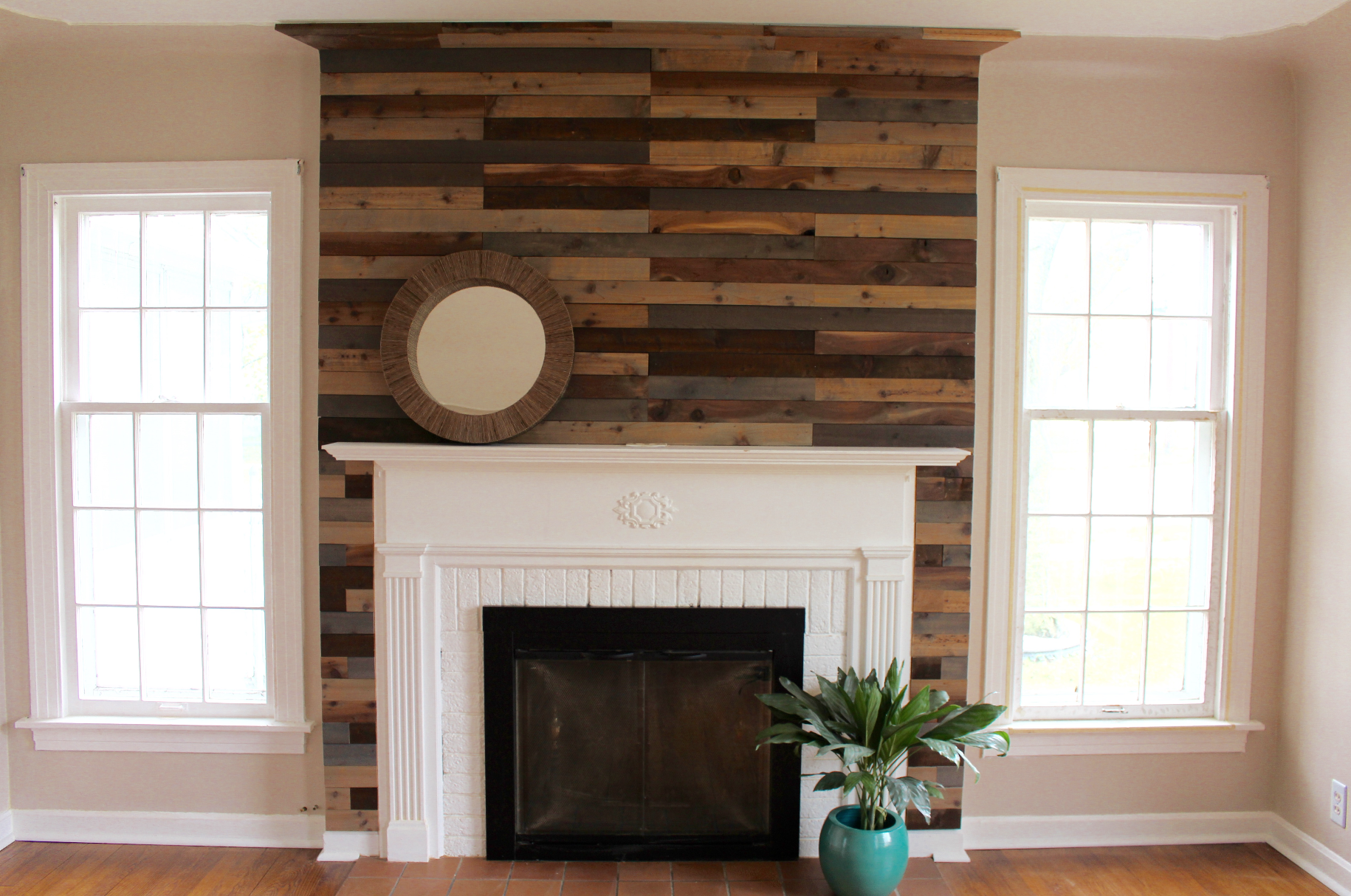 Finished! For about $65.00 and an afternoon of labor, this makes a great impact on how the house shows. Everyone that walked through the house commented on the wall. It was a great update to help this house stand out in the rental market.