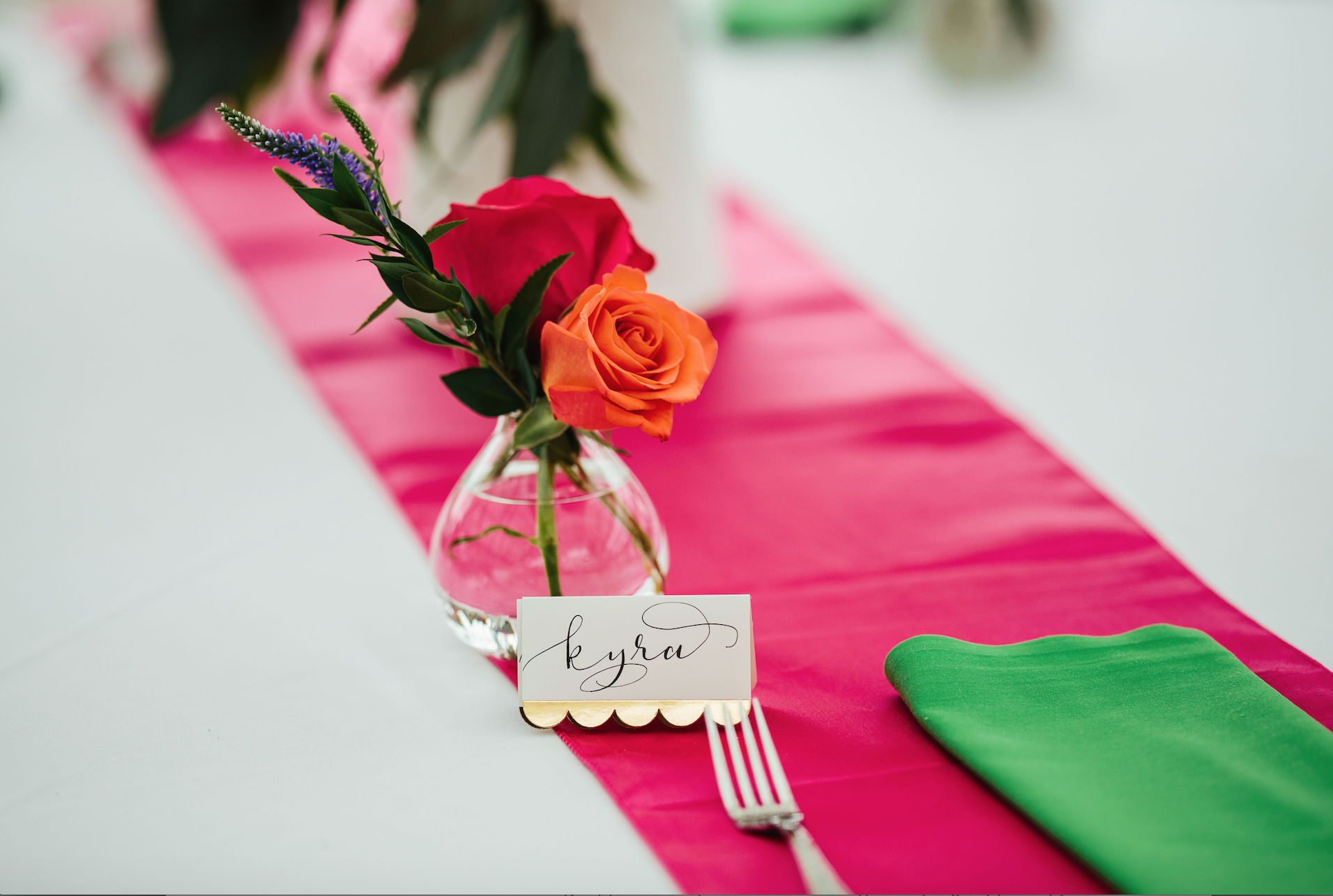 Place cards with bud vases