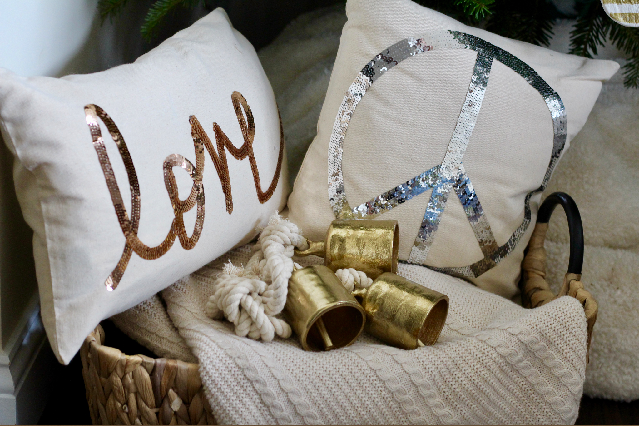 Gold bells with peace and love pillows