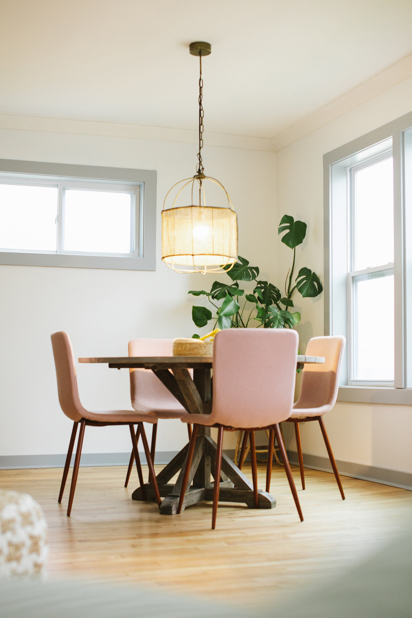 Pink was the perfect color choice for dining chairs paired with our grey teak table.