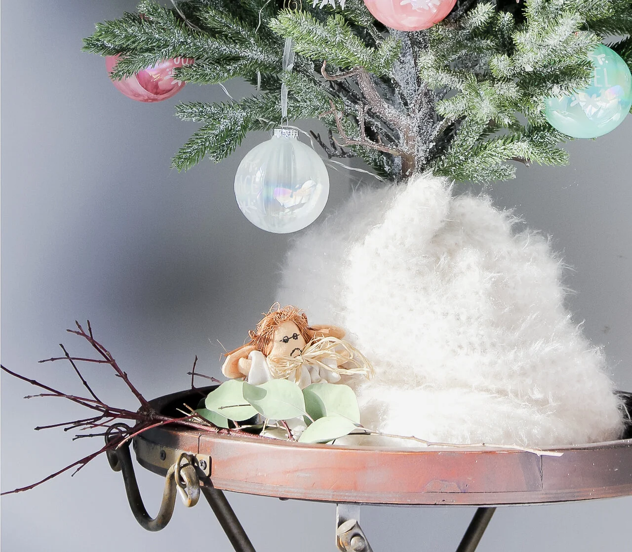 Scarf used as tree skirt for tabletop Christmas tree