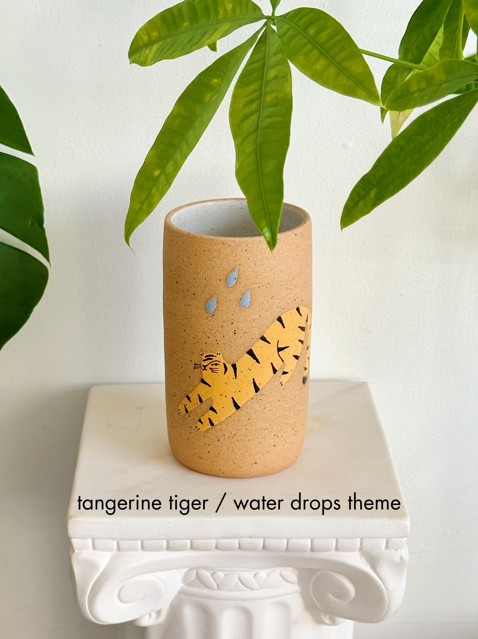 tangerine tiger water drops theme.png