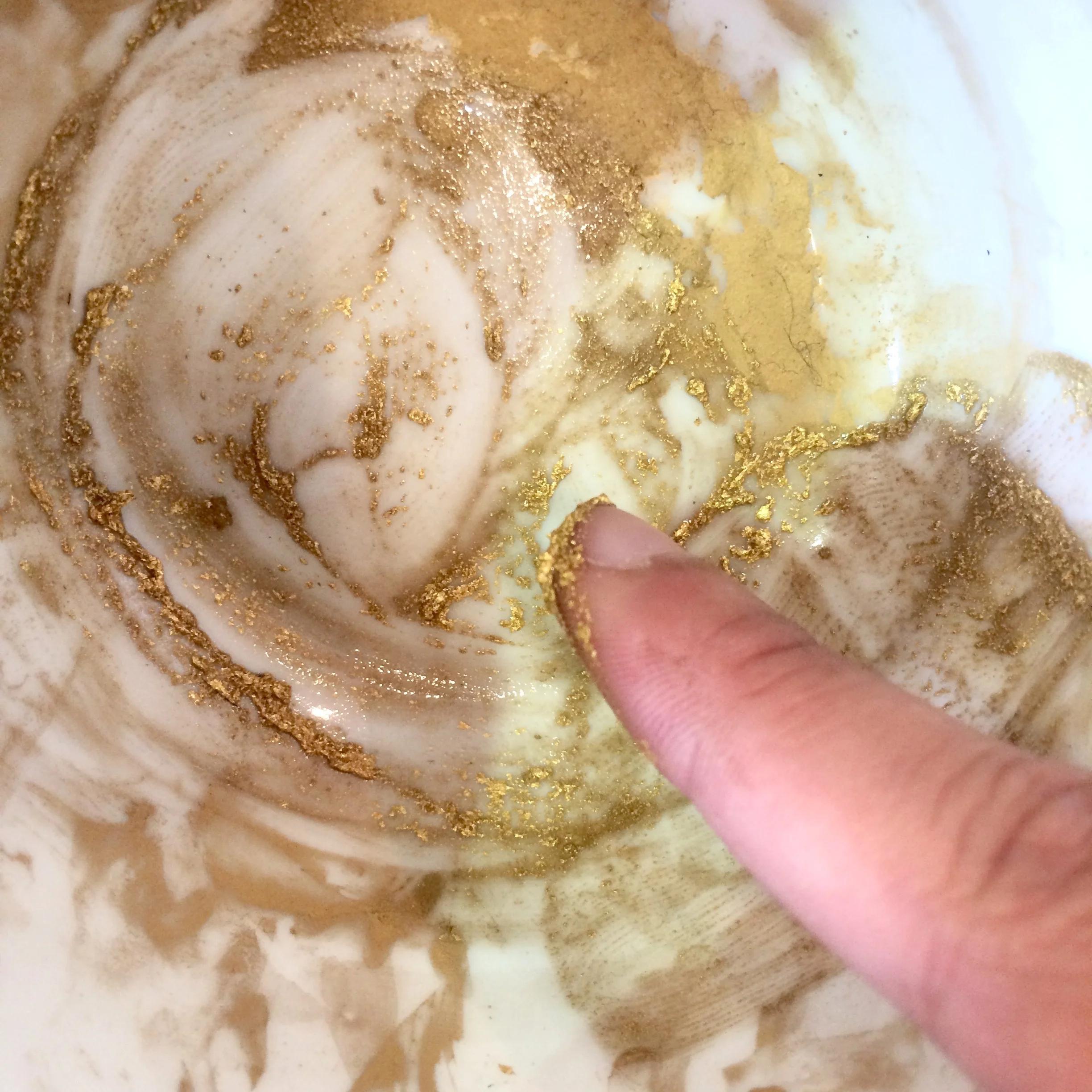 Grinding gold by hand