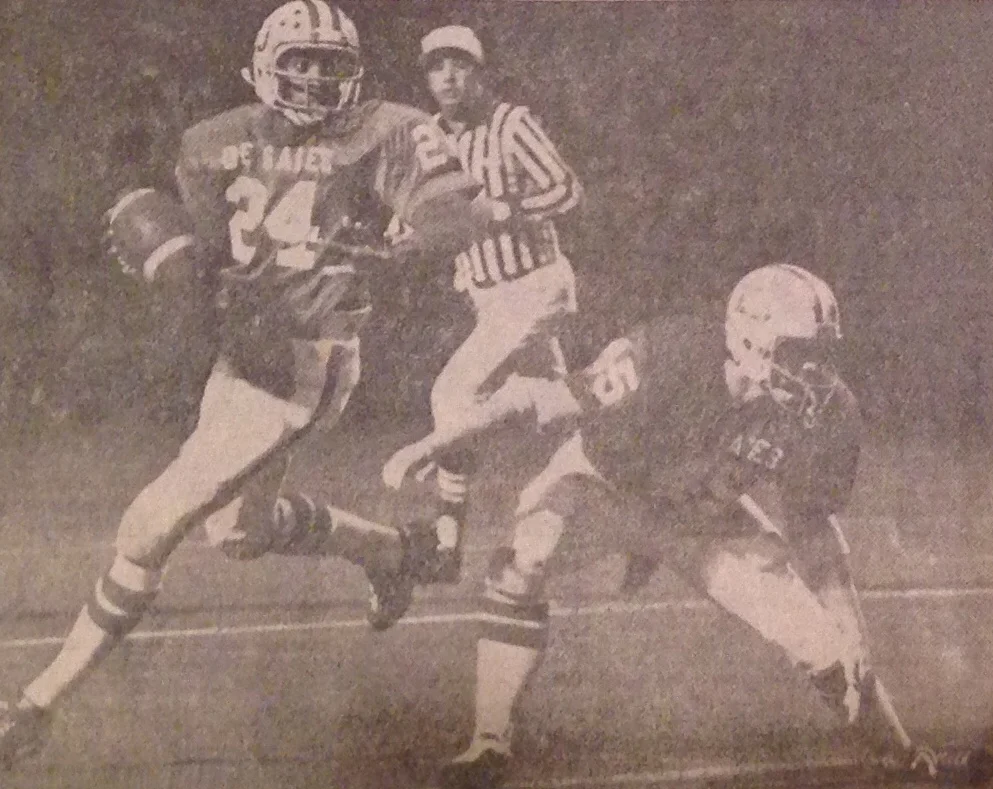 Junior Quarterback Eric Holleman (24) and senior fullback John Lawson (45)