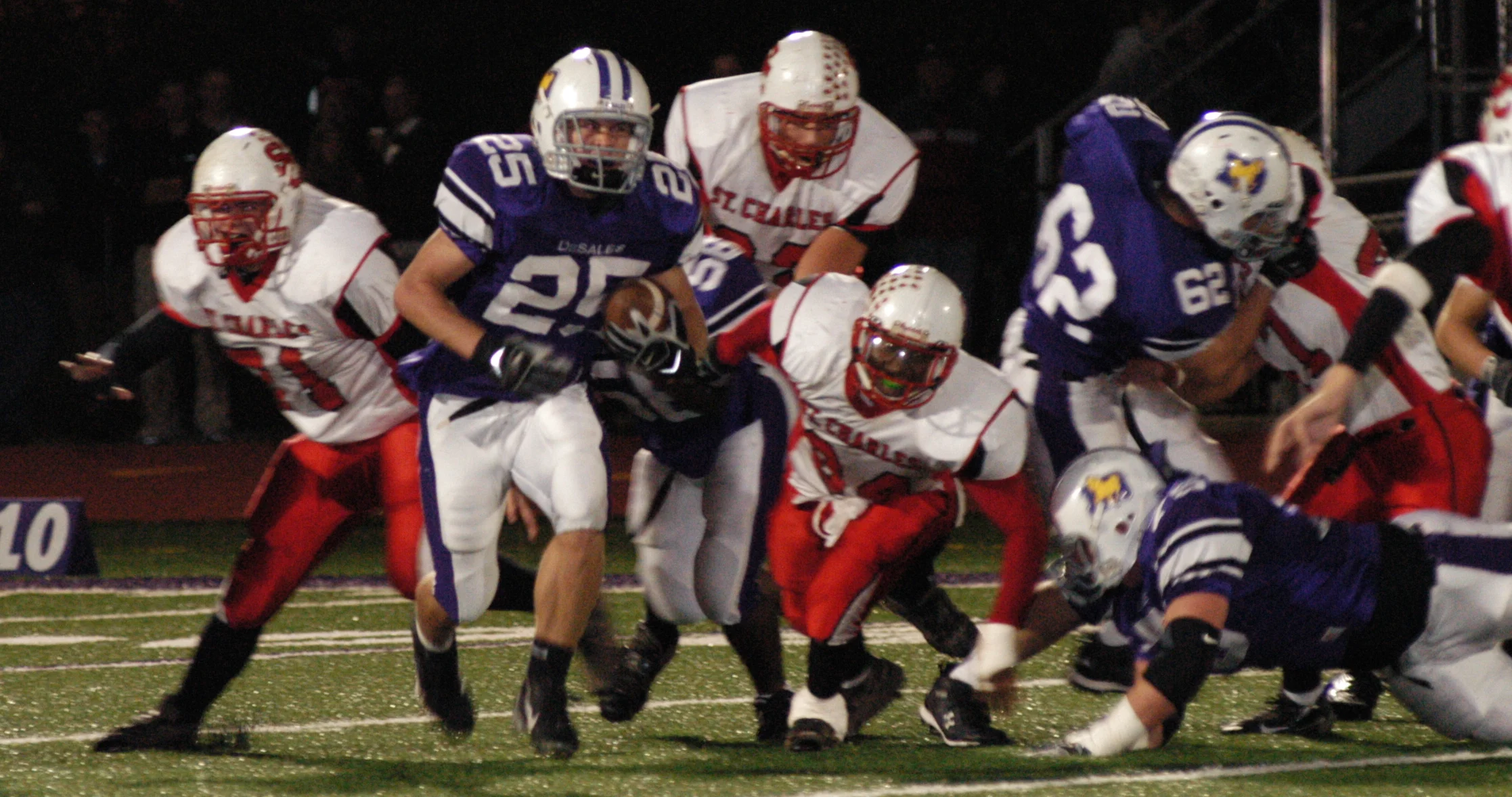 Junior running back Ryan Clark (25) rushed for 151 yards in the 30th straight win over St. Charles