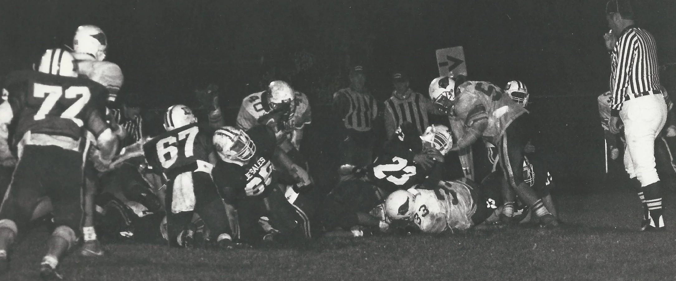 Tom Walsh (23) gets the carry against the Cardinal Defense