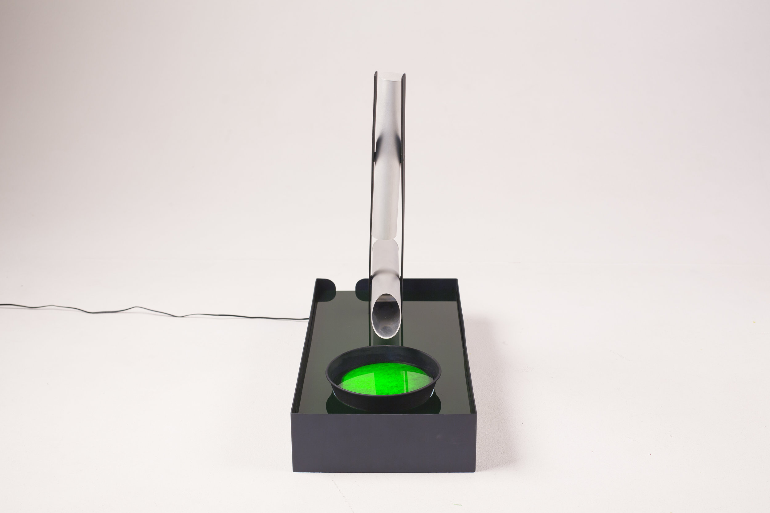 shishi odoshi lightI made this mechanised light as a reflection on the notion of E=MC2... &nbsp;In theory light has weight. &nbsp;In theory it could therefore power a shishi odoshi. &nbsp;But yeah fine, it would need to be the size of a few suns...&nbsp; Made from anodised aluminium, sand-blasted aluminium, acrylic, and tech bits. &nbsp;Photo credit: Dennis Grauel.