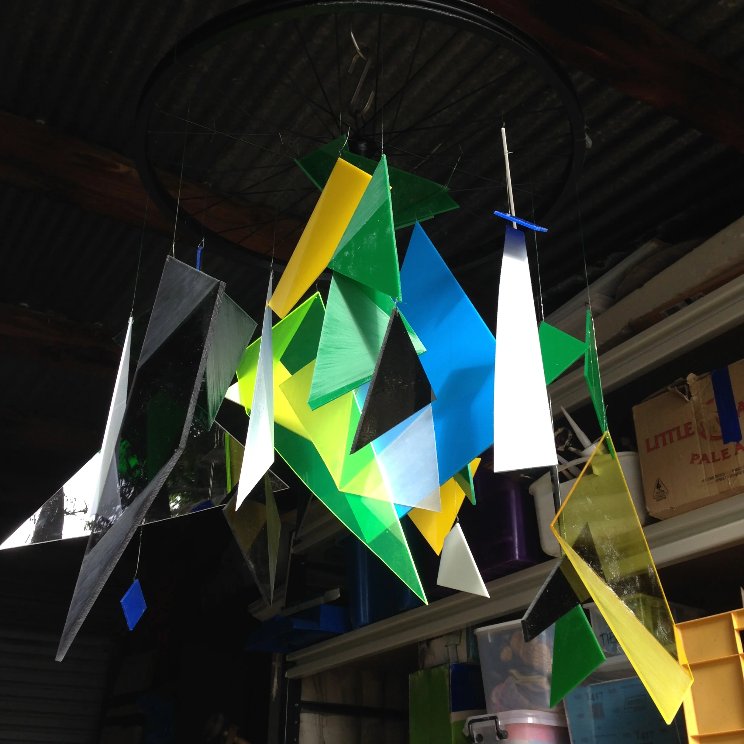 when only the decorations you make yourself will doMy client was having a 60th birthday. &nbsp;"No gold, no balloons, no kitsch stuff." &nbsp;Her invitation had blue and green geometric patterns. &nbsp;I went from there to create six pieces: a hangi…