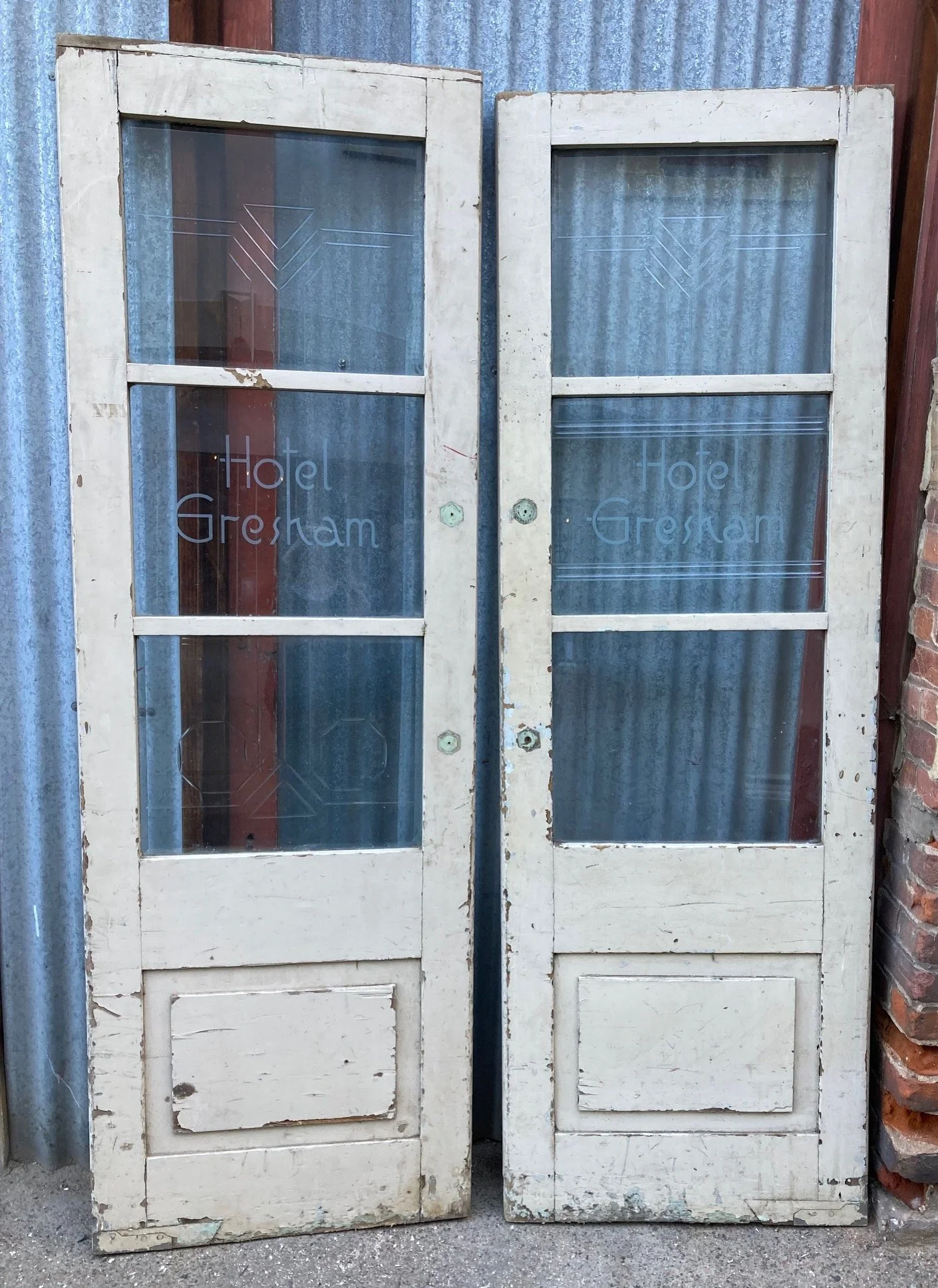 Original glass and timber swing doors, ex Gresham Hotel