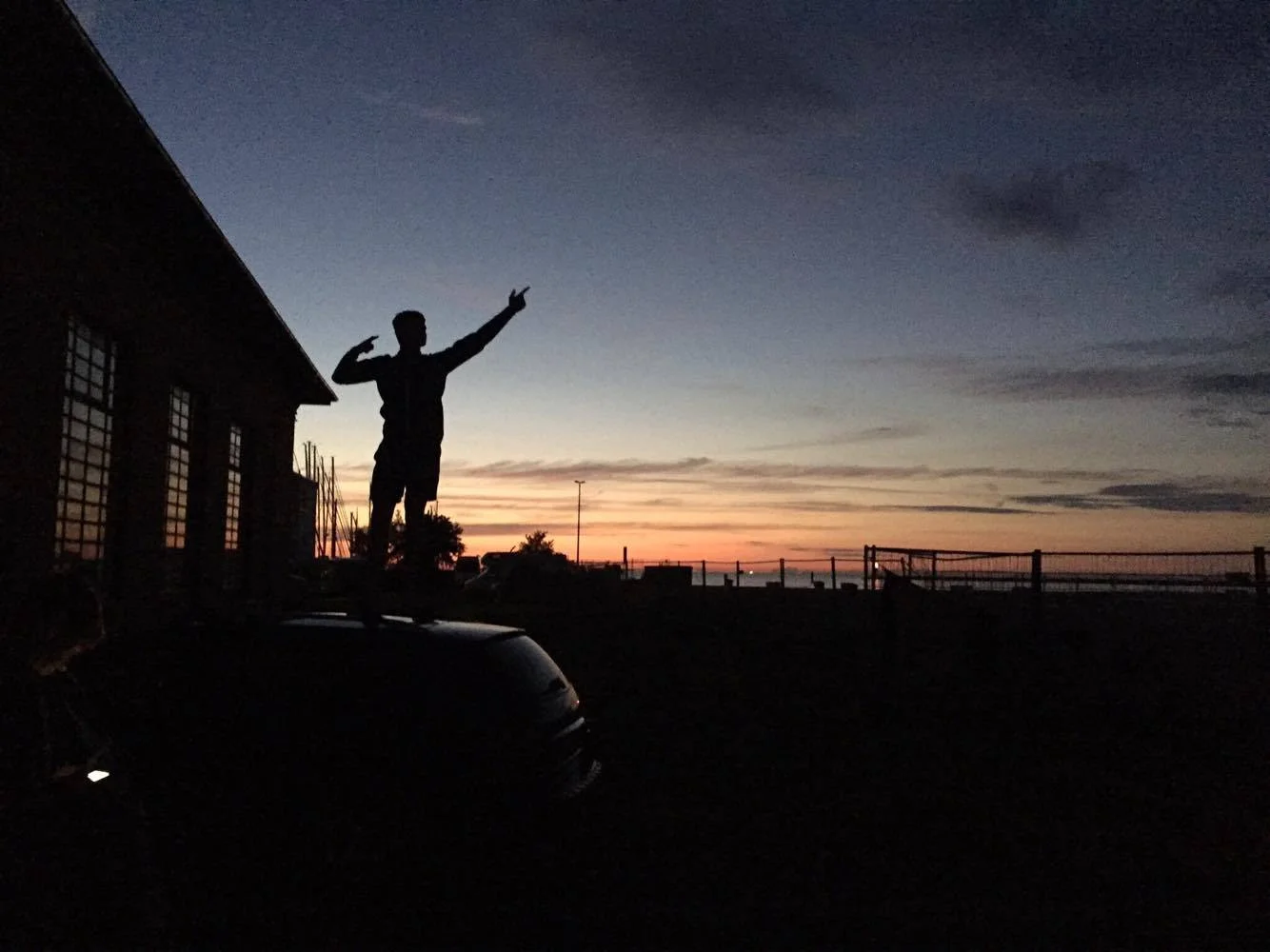 Playing around in front of a stunning sunset.