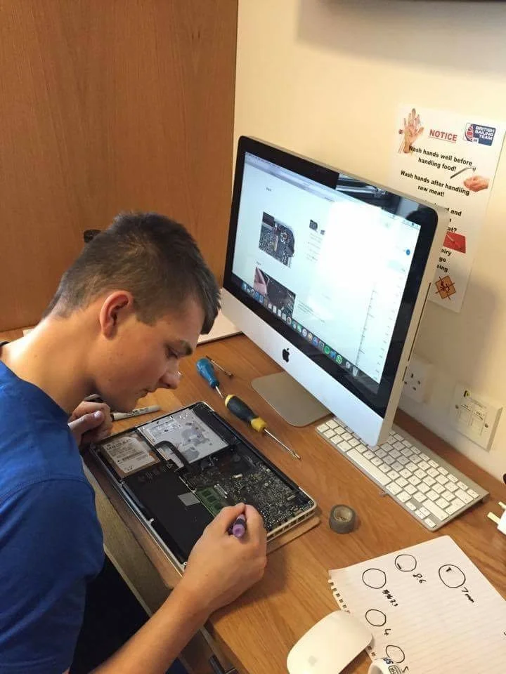 Repairing a friends computer - one of my many hobbies I enjoy in my free time.