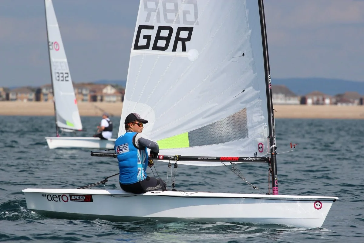 Note all the diagonal creases in the sail.