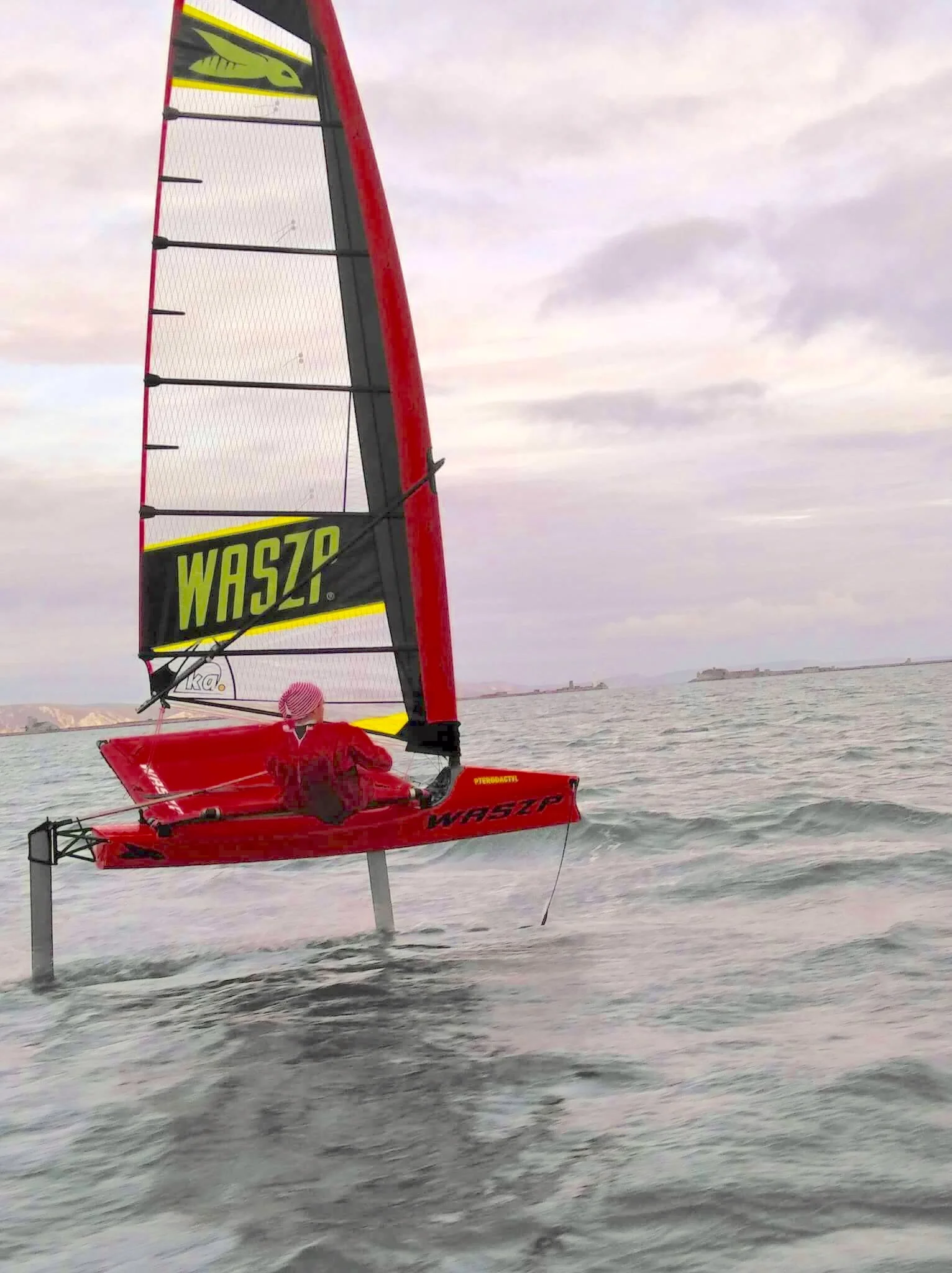 Great photo of me flying above the waves with the red bauble suit on.