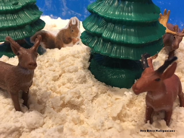 We used some leftover cut outs from the first activity along with plastic animals for this.