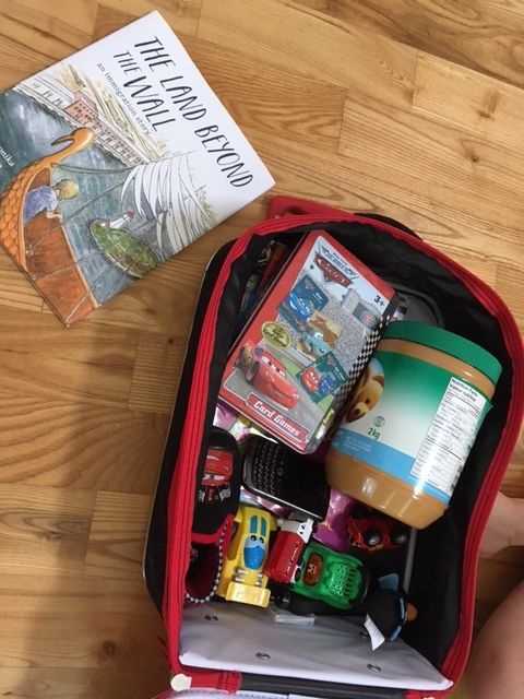 Yes, that's a broken Blackberry phone in my son's suitcase and one slipper.