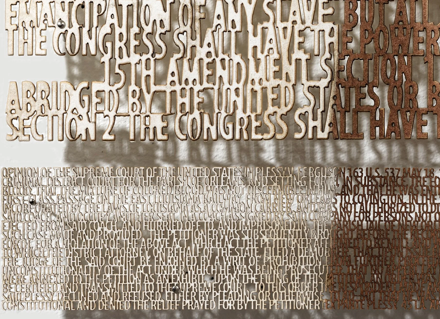  Reconstruction, 1862-1896 Close up image of text from the 15th Amendment and SCOTUS Plessy vs. Ferguson, 1896  
