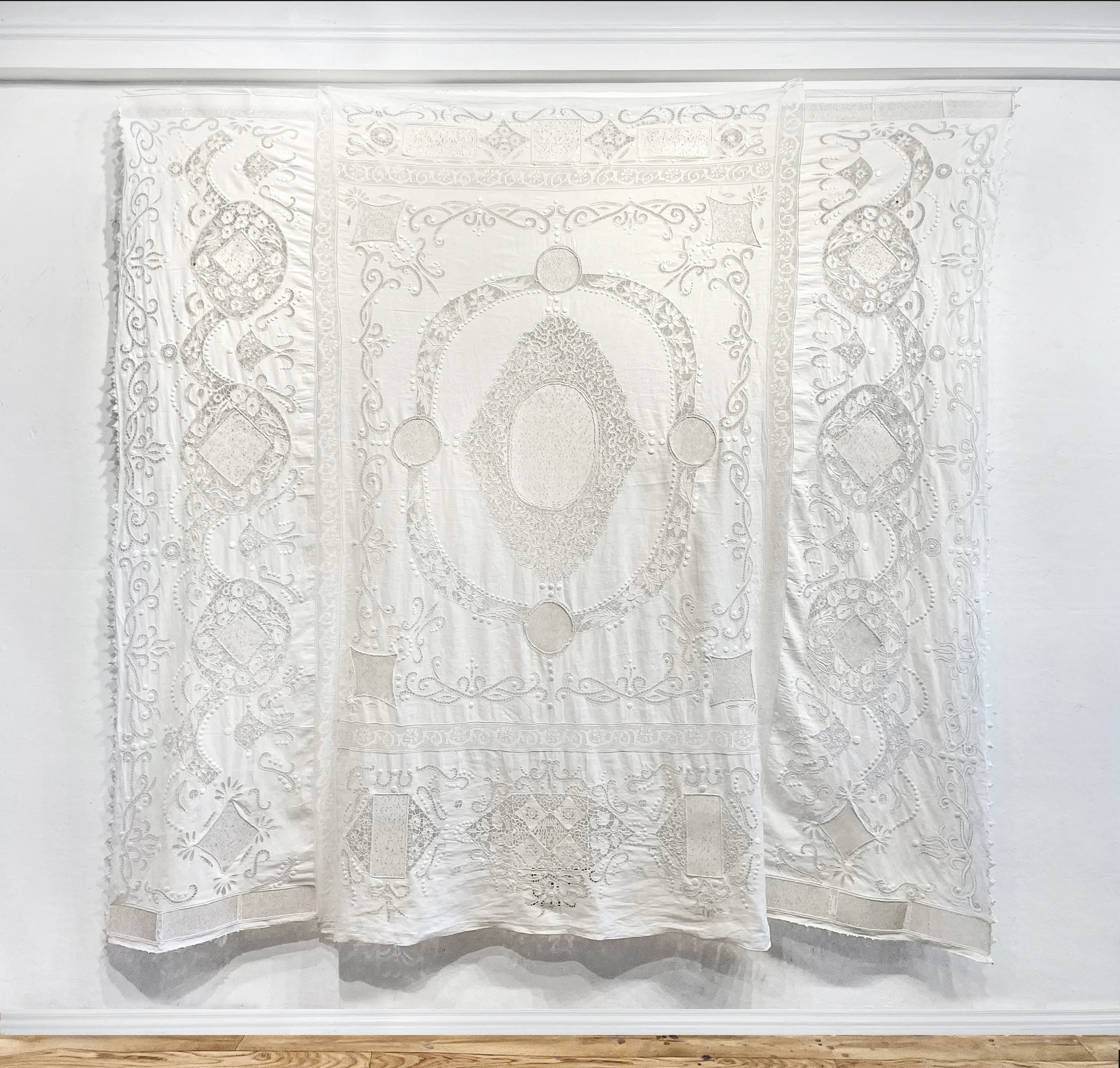 Thank America For the Violence Against Women Act of 1993, laser cut paper sewn into antique wedding bed sheet, 84 x 80 inches ©2026