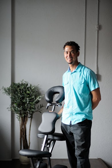 Jesse-RMT and his specialized portable chair where employee's enjoy the great benefits of massage at work. 15 minutes of peace and paradise.