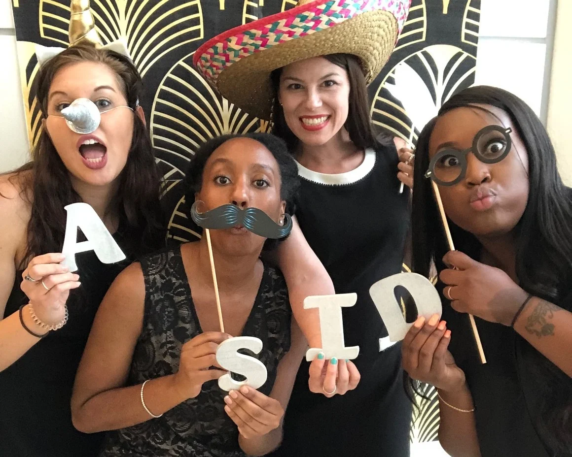 ASID STUDENT MEMBERS AT THE PHOTO BOOTH FOR THE SUMMER MIXER