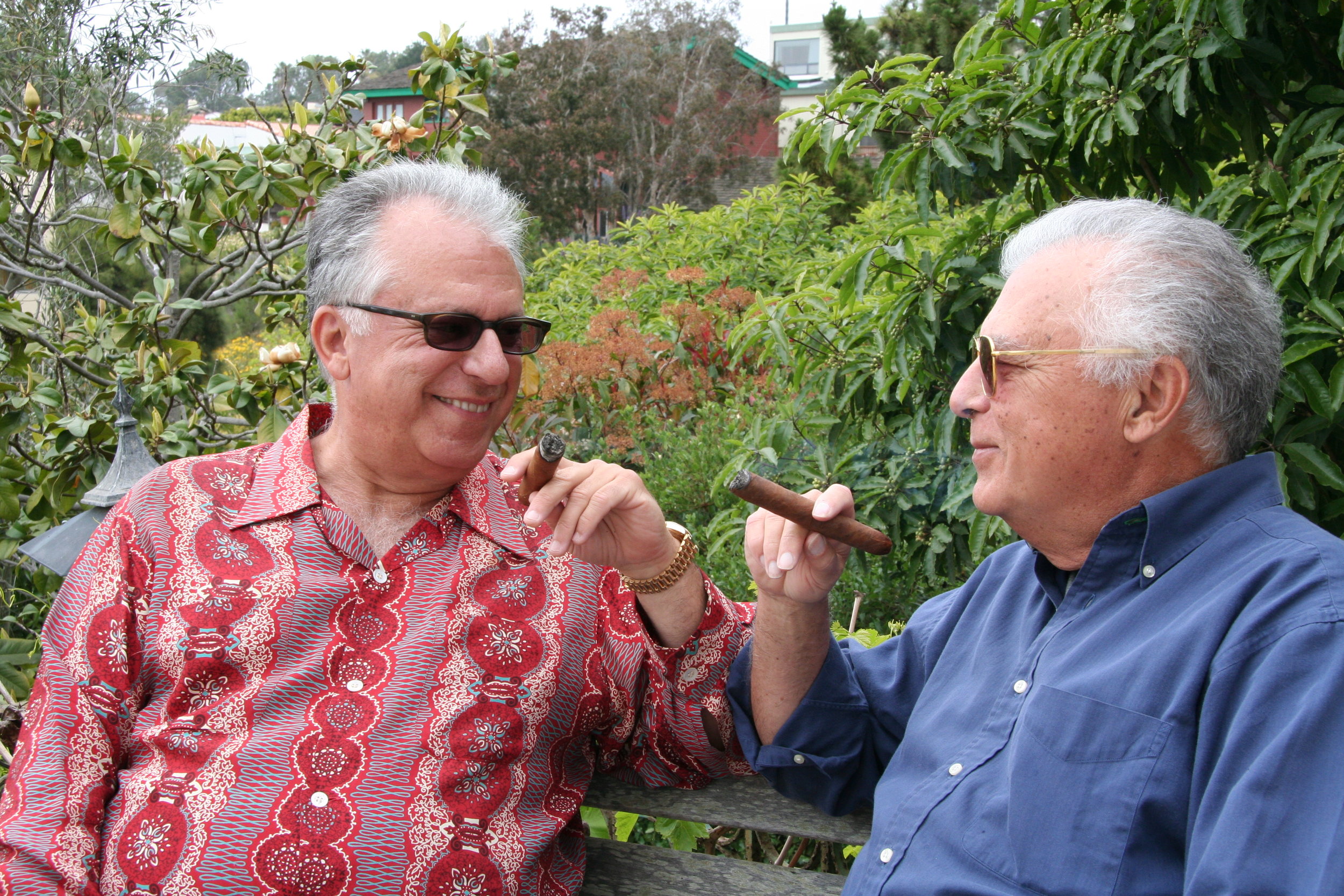 Pepe and Celin smoking cigars