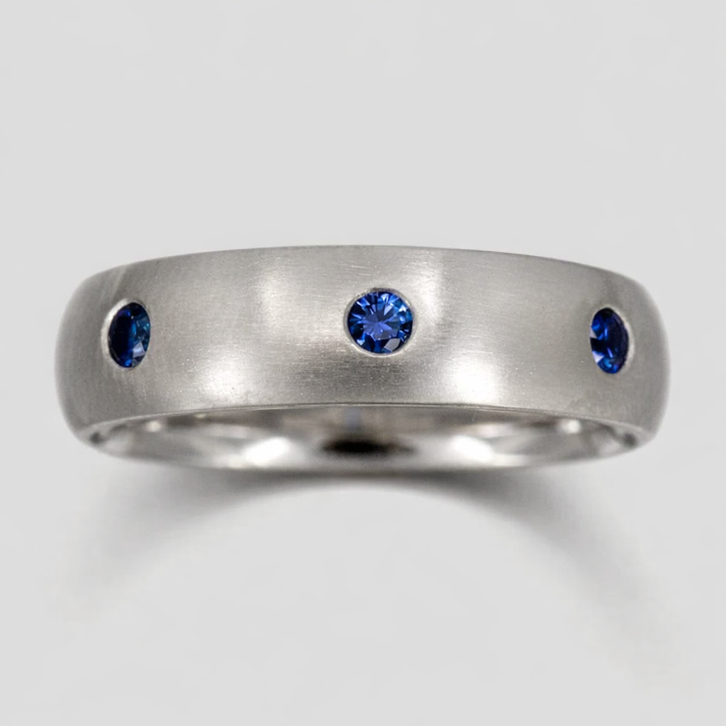 Platinum and Flush-Set Sapphire Band