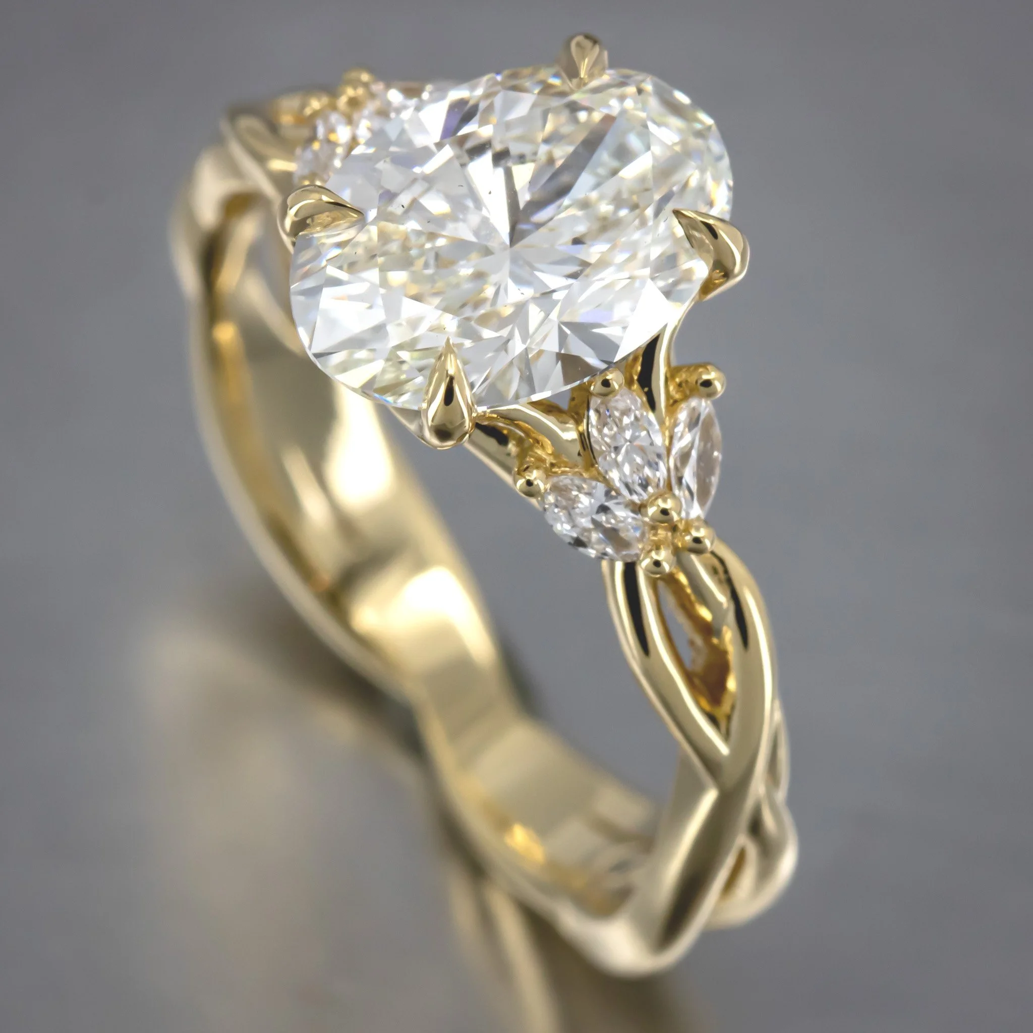 engagement-ring-custom-oval-diamond-solitaire-organic-overlapping-vines-diamond-marquise-accents-18K-yellow-gold-RT768453.jpg