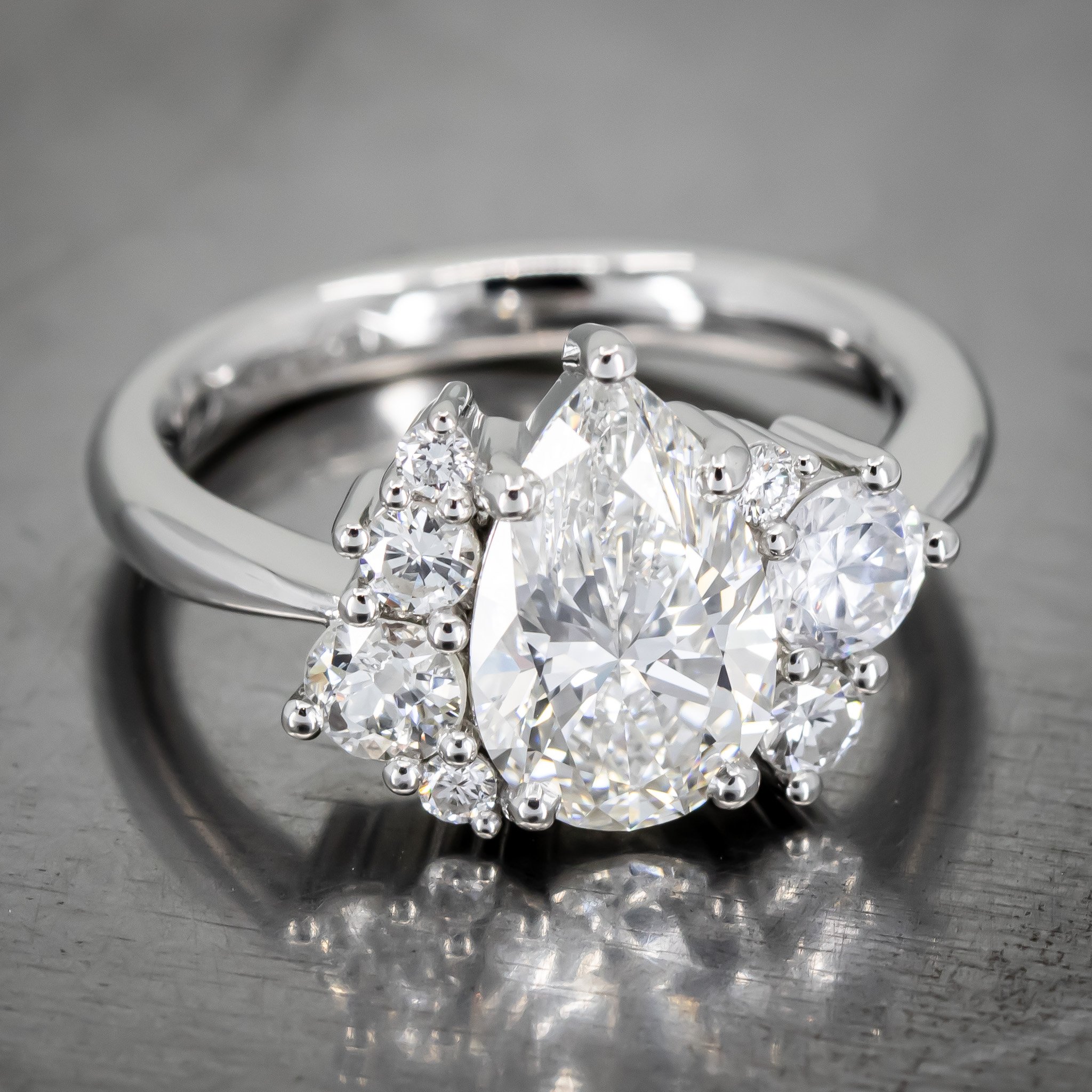 engagement-ring-custom-pear-shaped-diamond-round-diamond-cluster-asymmetrical-platinum-RT238761.jpg