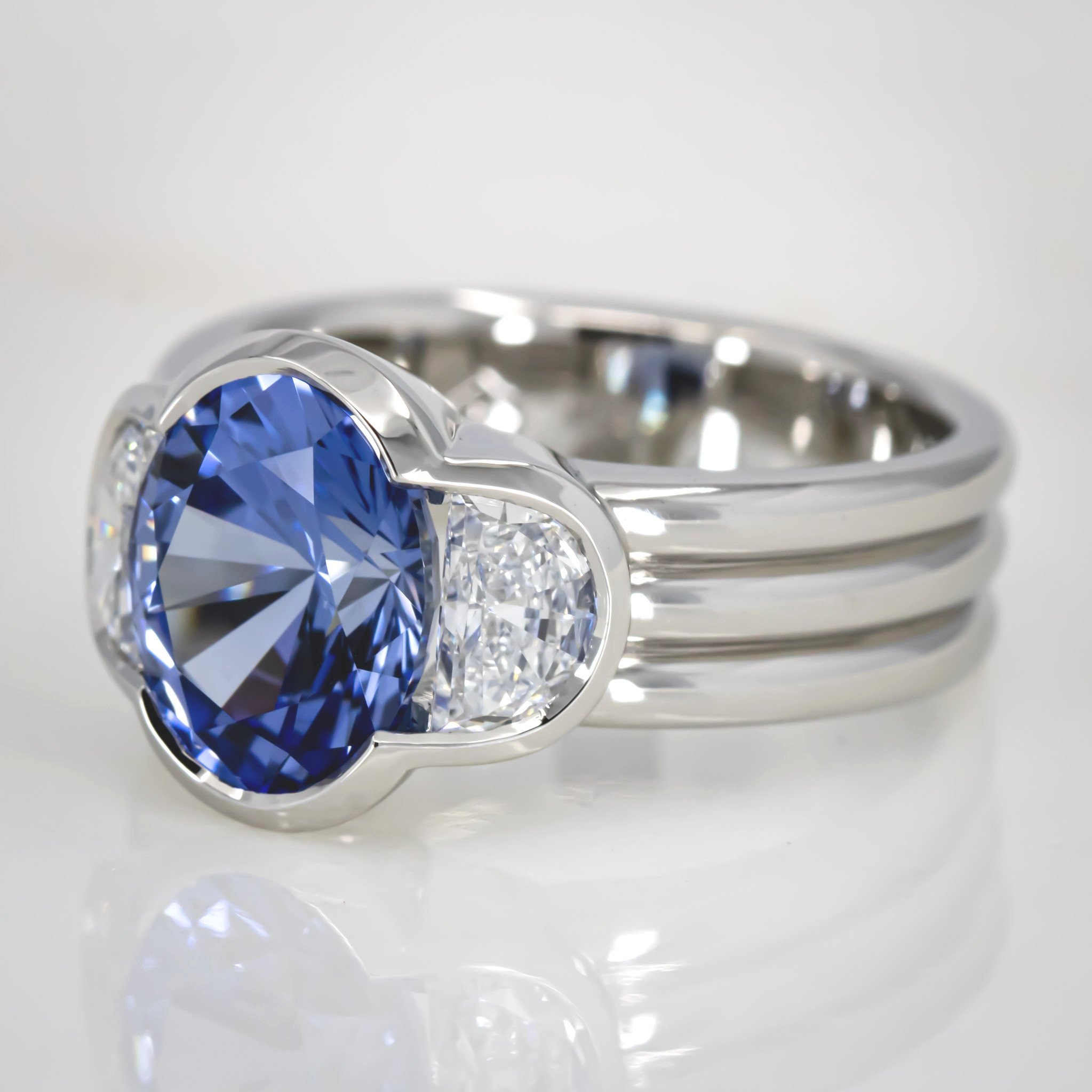engagement-ring-custom-oval-lab-sapphire-half-moon-diamond-three-stone-bezel-three-band-platinum-RT416285.jpg