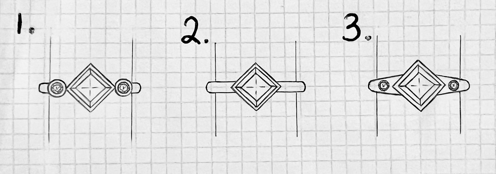 Sketch of three rings, each with a square centerpiece, shown in three different alignments on graph paper.